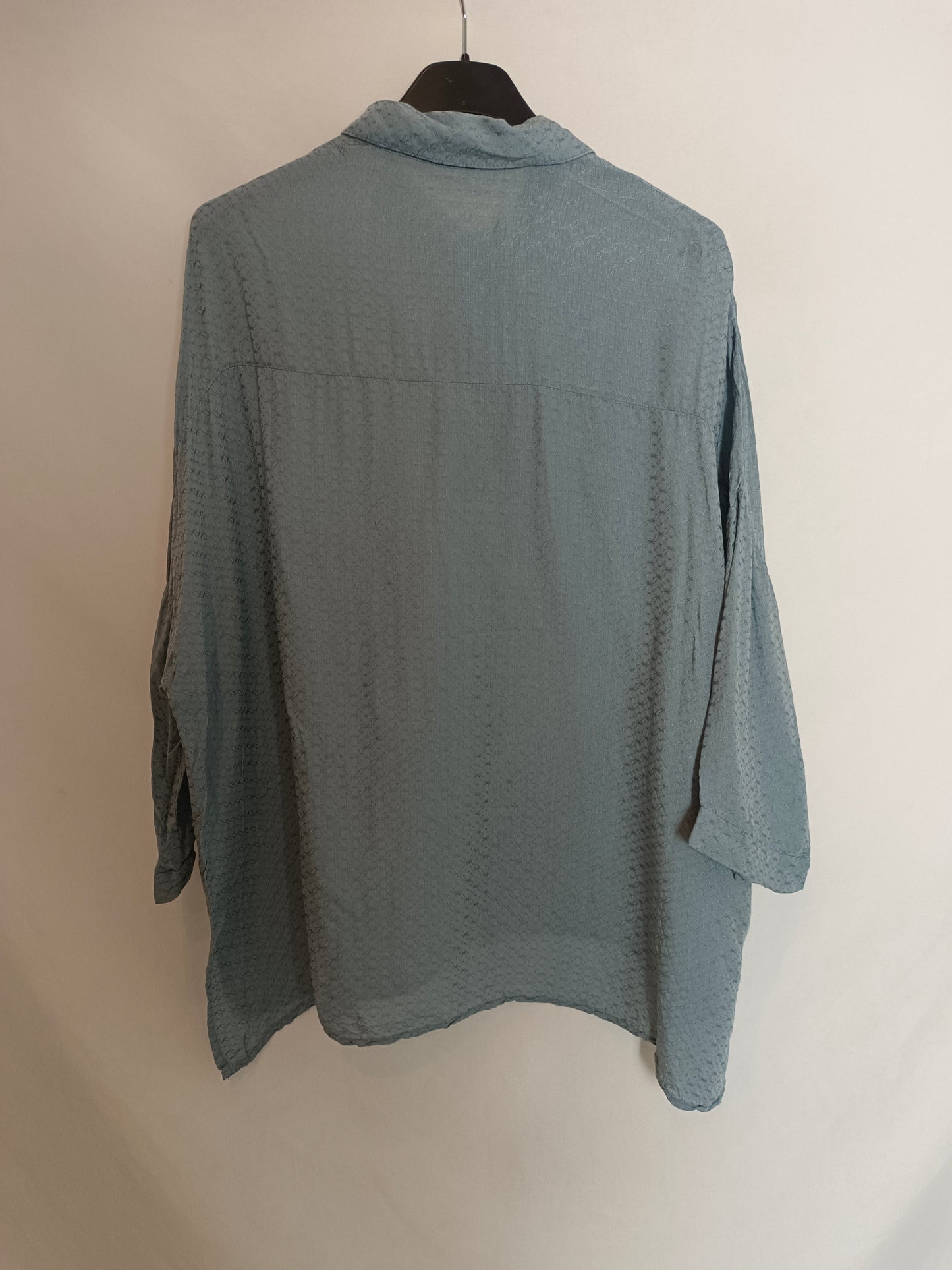 NOON. Blusa textura azul T.xs