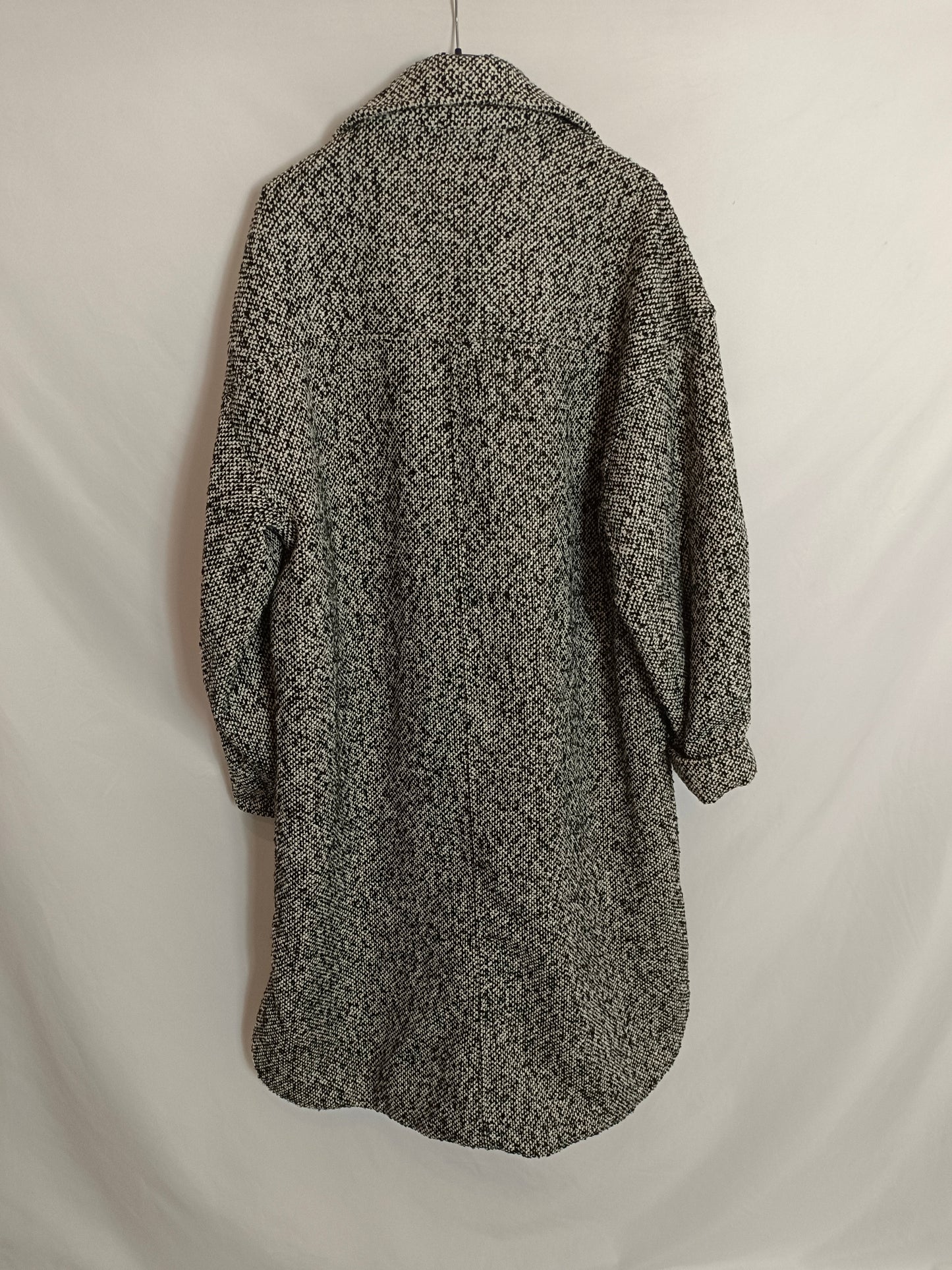 H&M. Black and white speckled coat Ts