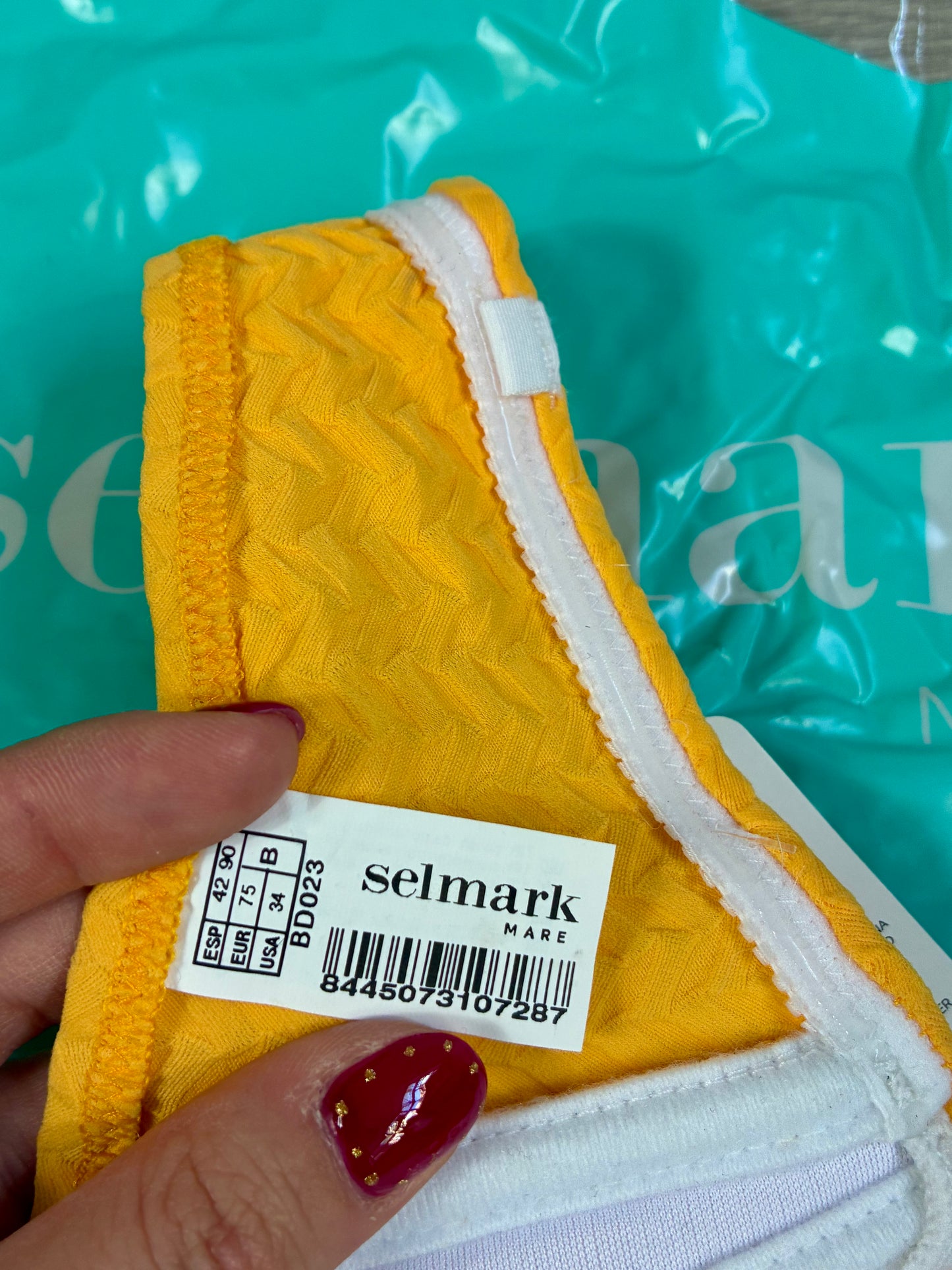 ODYSSEY. Brown swimsuit. TS