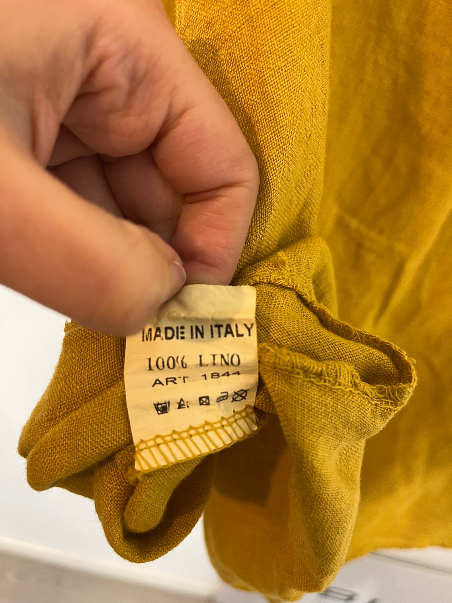 OTHER. Mustard linen blouse with neckline detail. TL