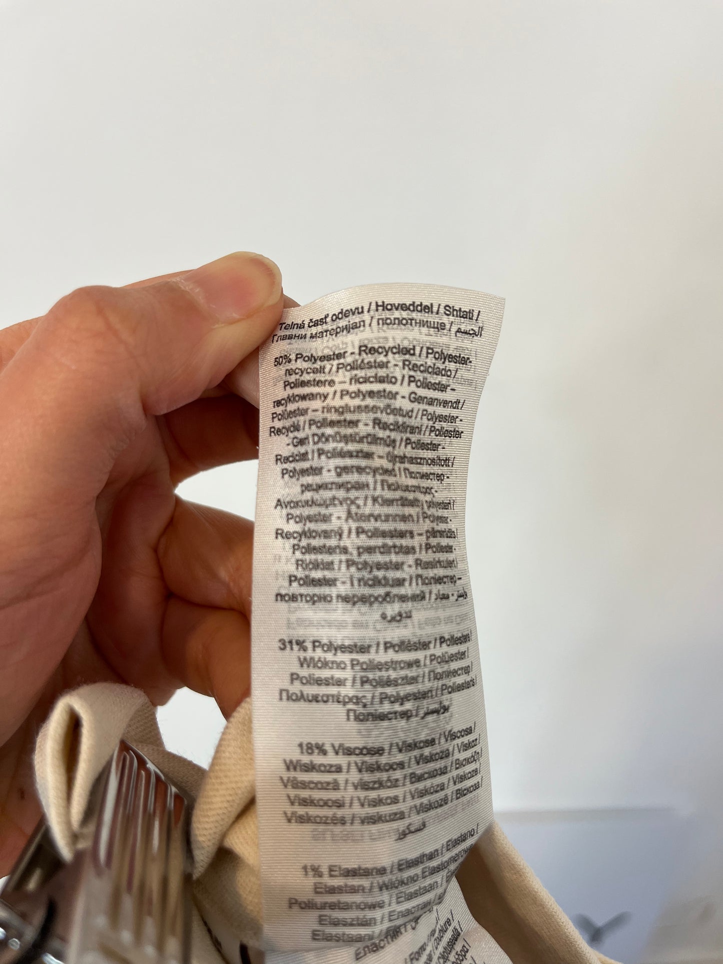 SELECTED. Flowing beige pleated trousers, size 34