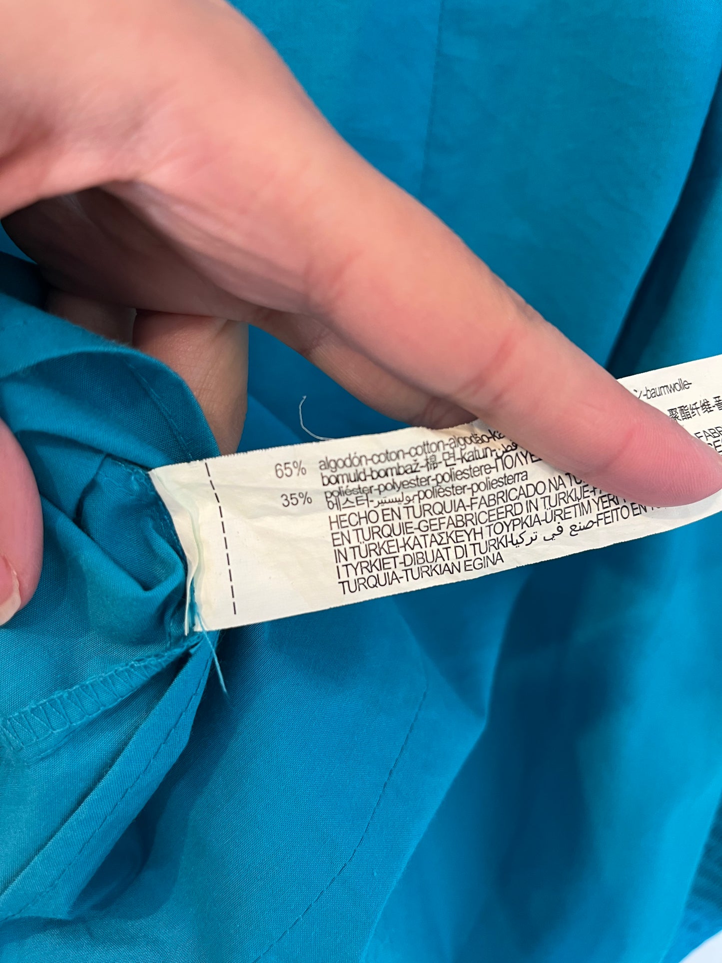 ZARA. Blusa azul turquesa detalle puños. T S