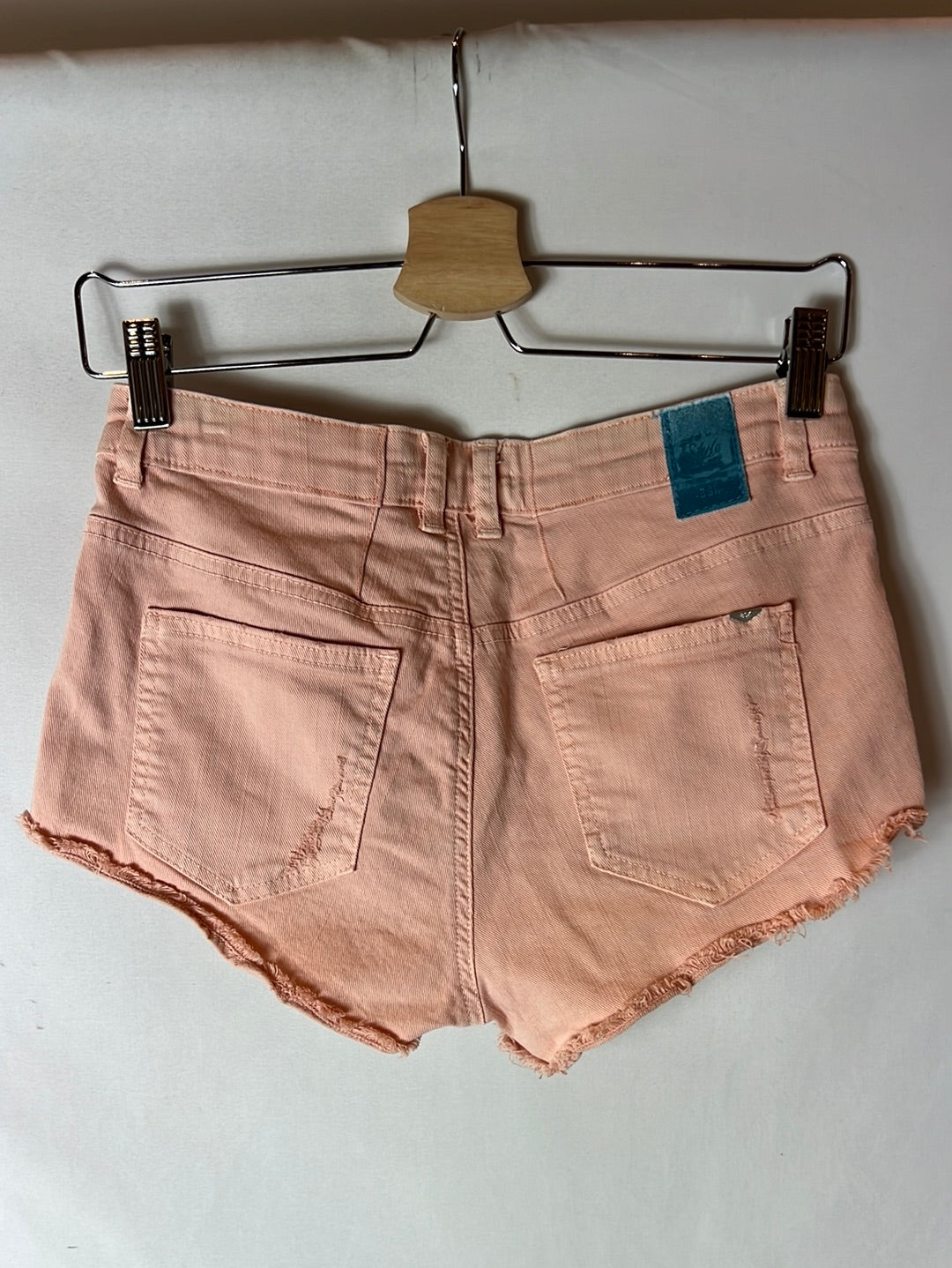 BERSHKA. Ripped light pink shorts. Size 34