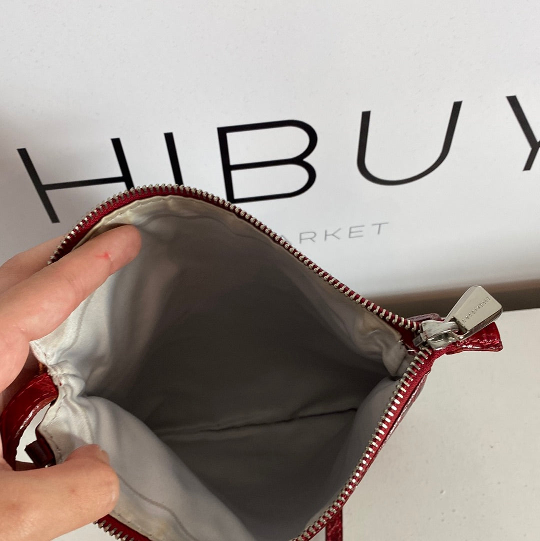 COCCINELLE. Red leather shoulder bag