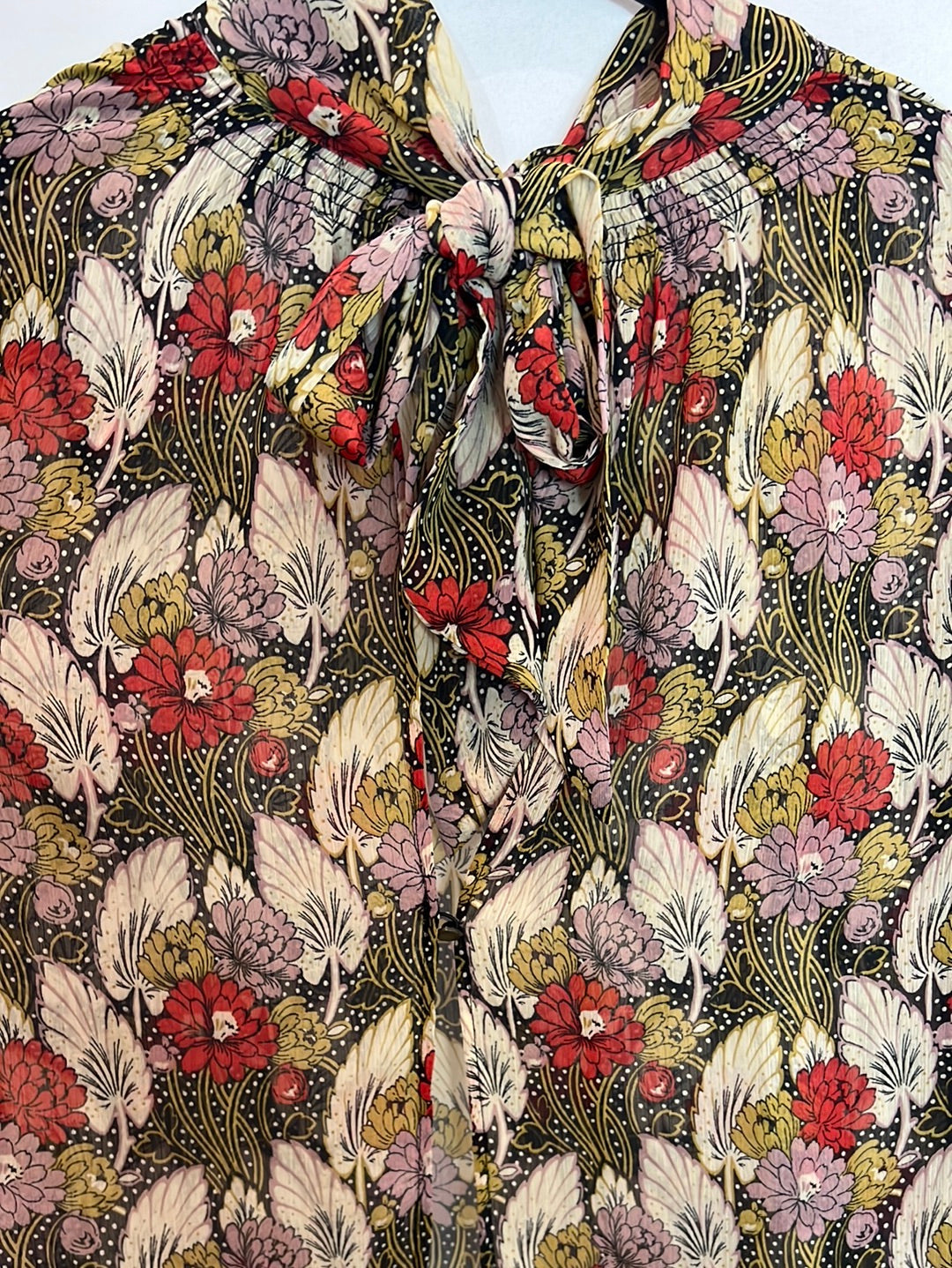 TOPSHOP. Blusa semitransparente apertura espalda. T 36