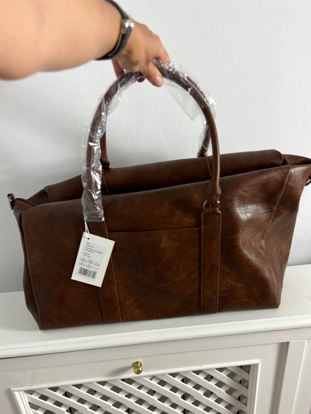 PIER ONE. Faux leather travel bag