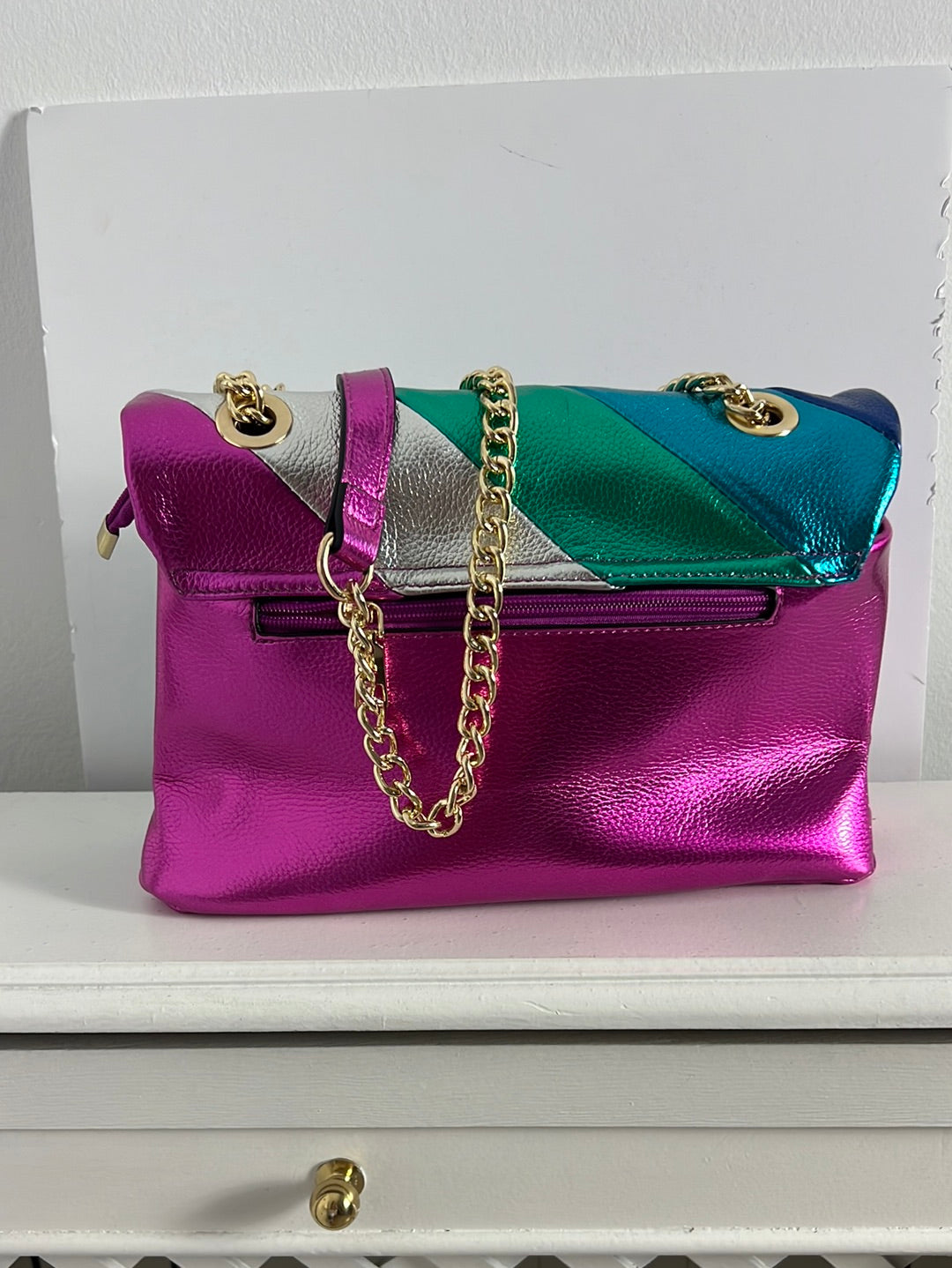 OTRAS. Bolso multicolor metálico