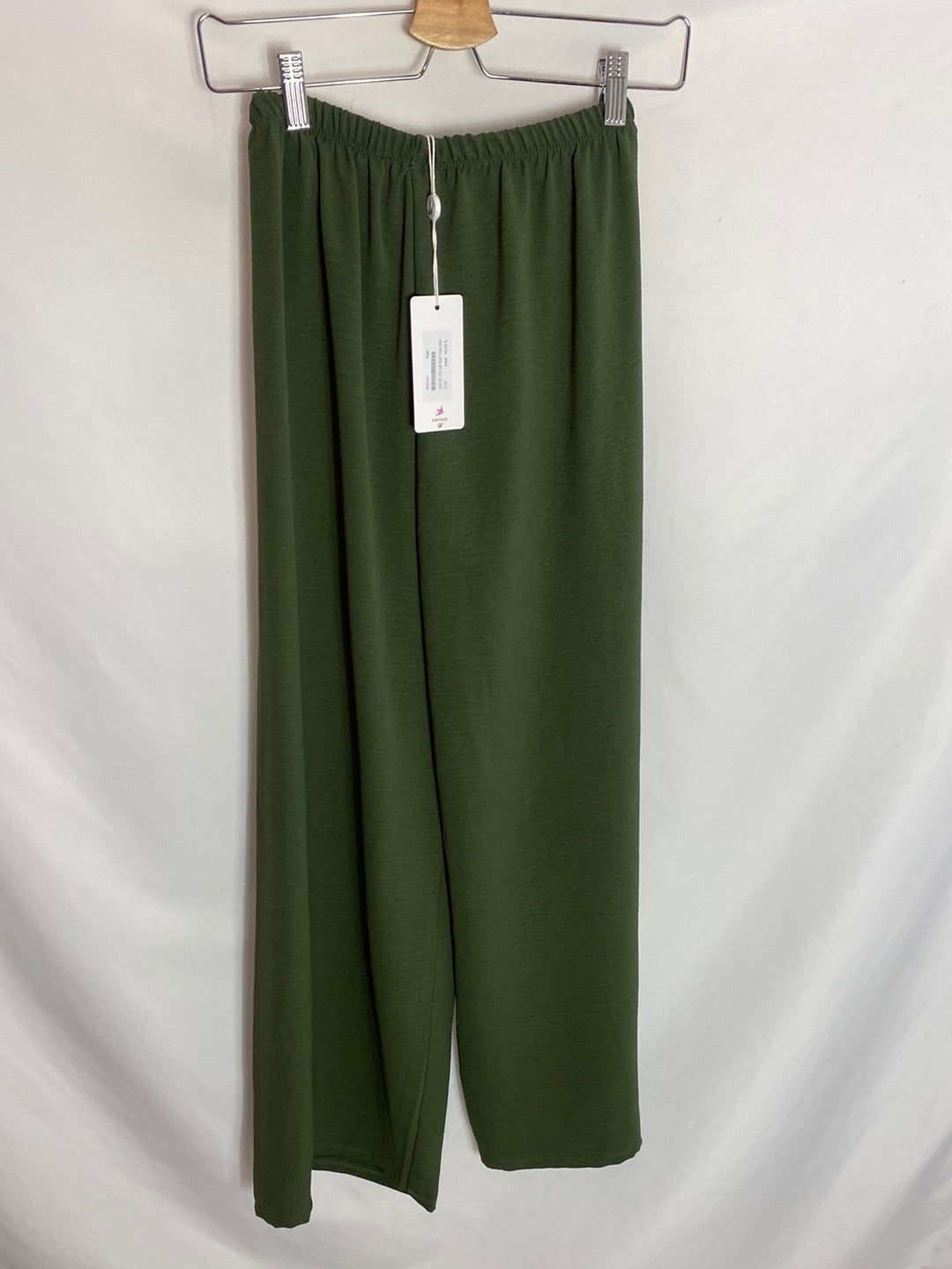ALGO BONITO. Pantalón verde con lazo. T.u