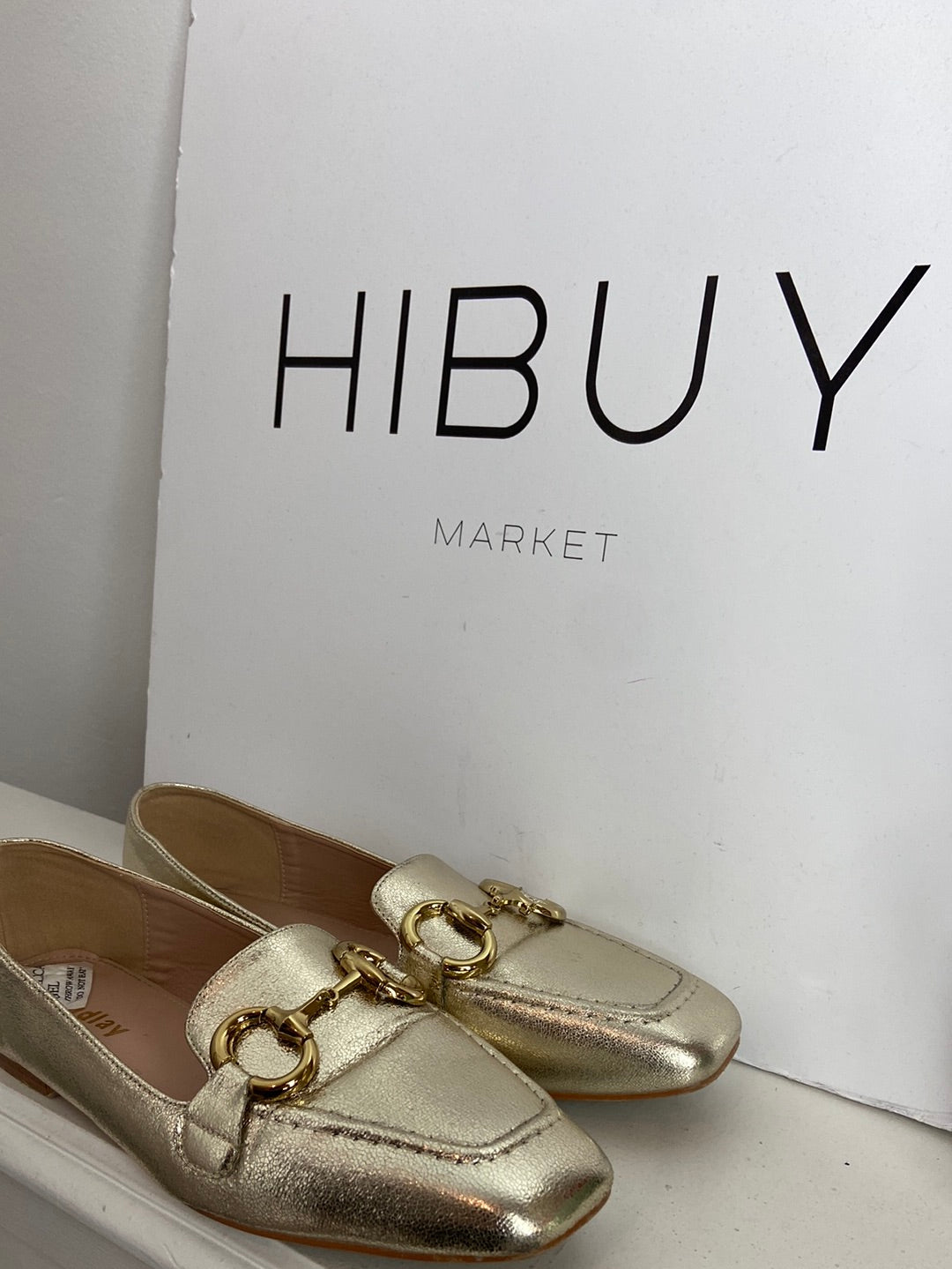 FINDLAY. Gold-tone loafers with buckle detail, size 38