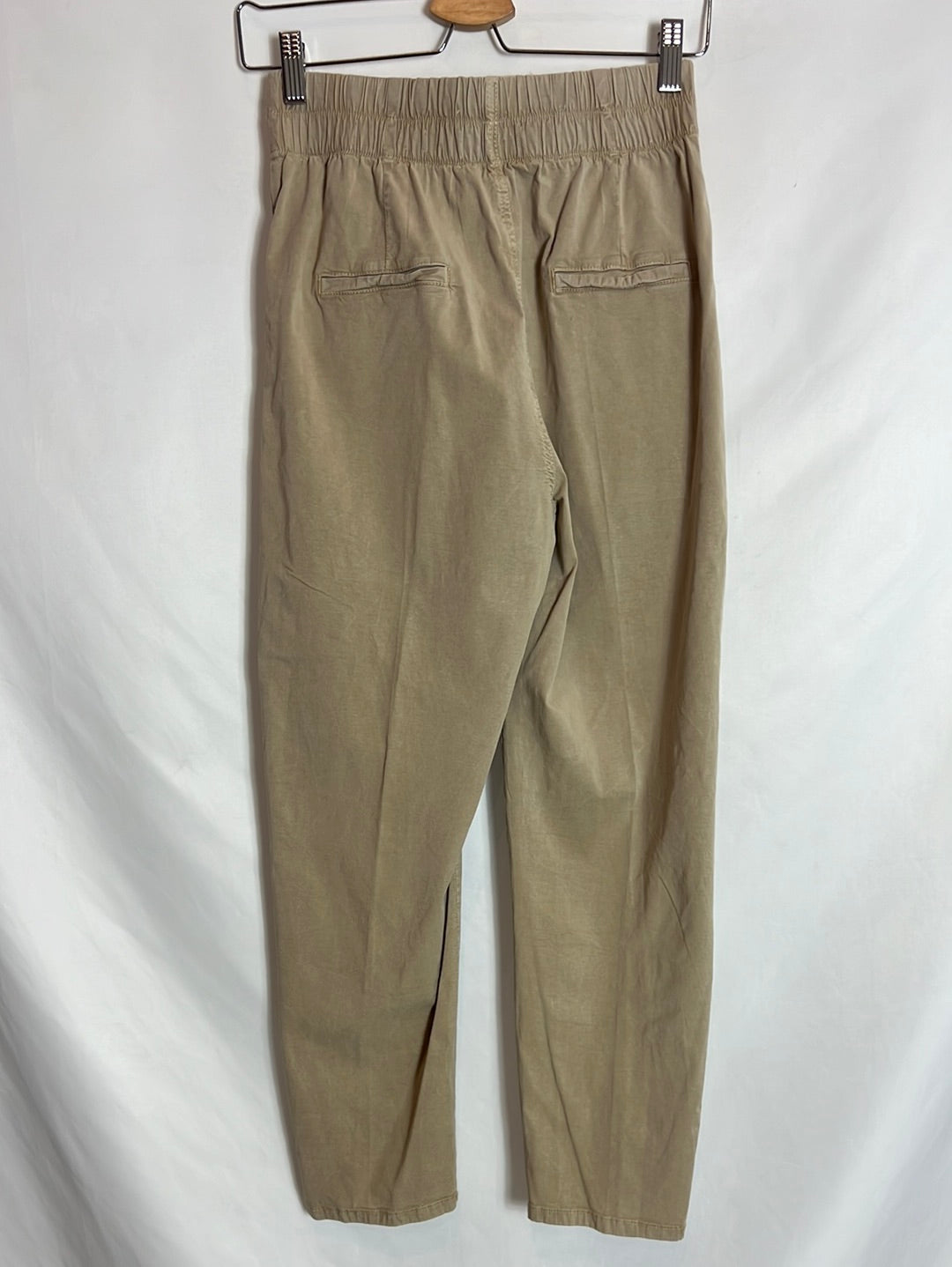 OTHER. Beige slouchy button-down pants. TS