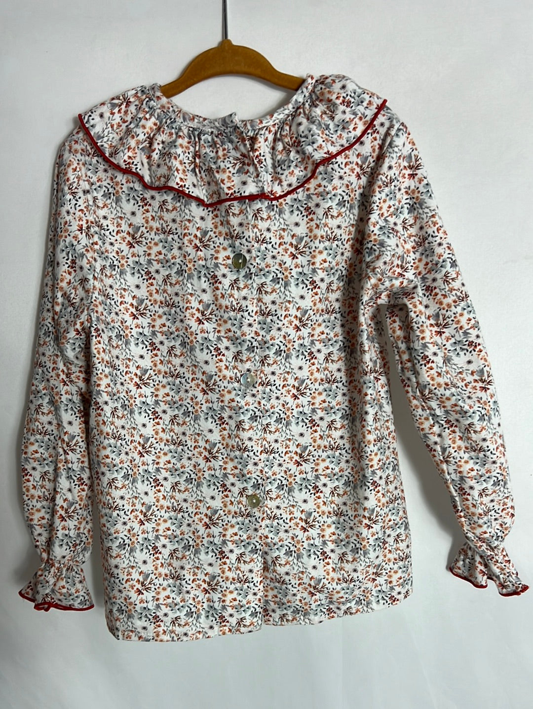 REGINA FOR KIDS. Blusa flores mini tonos naranjas. T 6 años