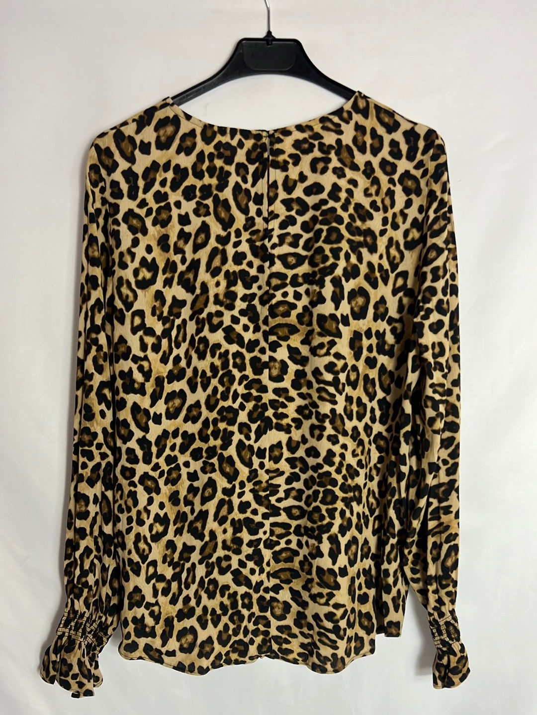 H&M . Blusa fluida animal print. T 36