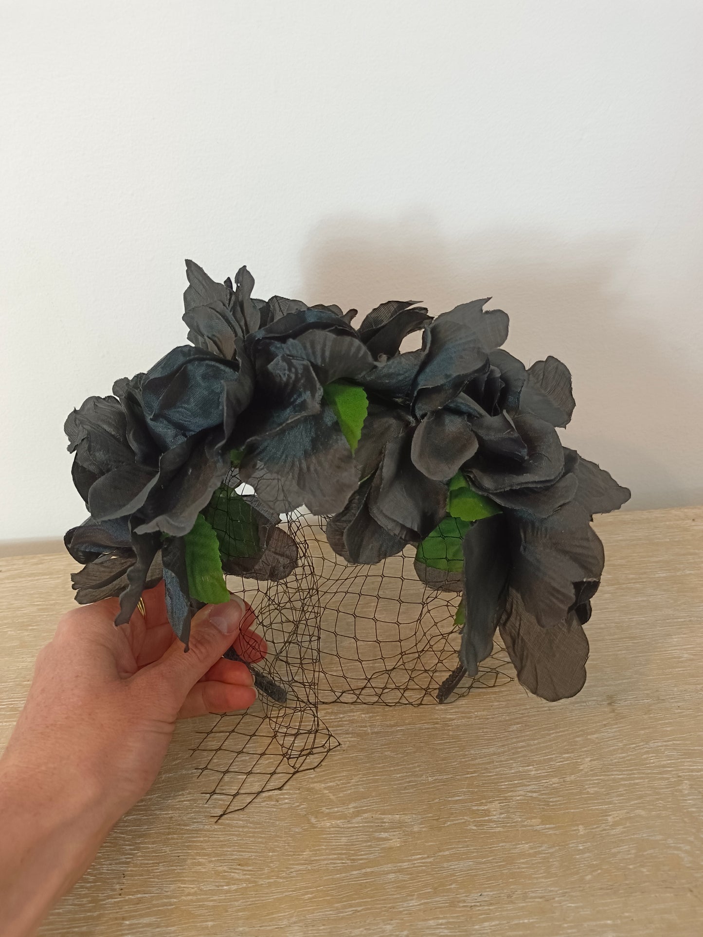 MASARIO. Black floral headdress