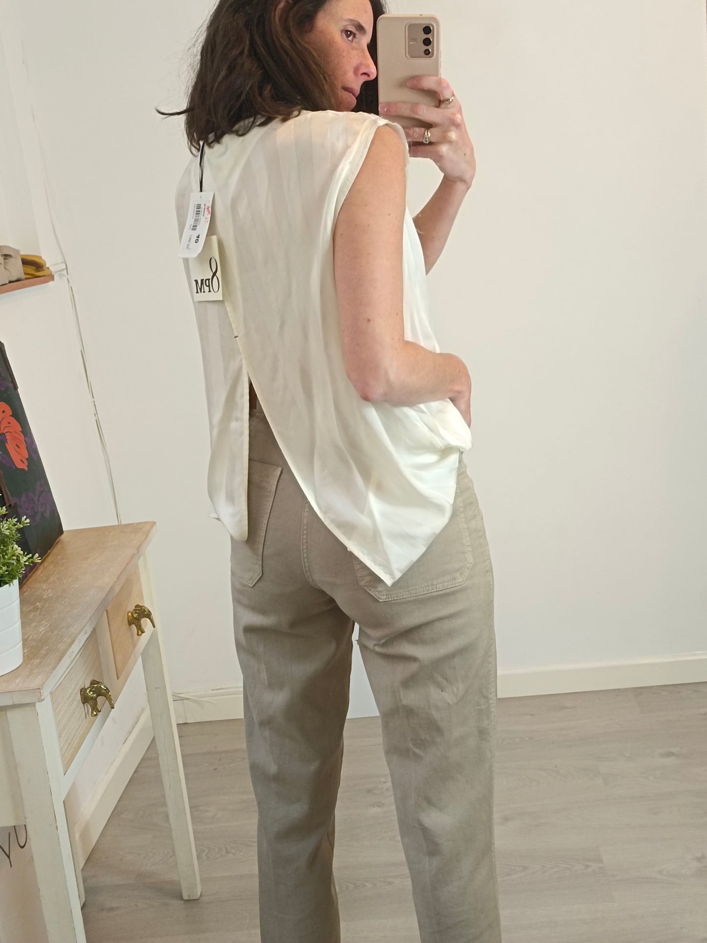 8 PM. Flowy top with striped back detail. TM/L