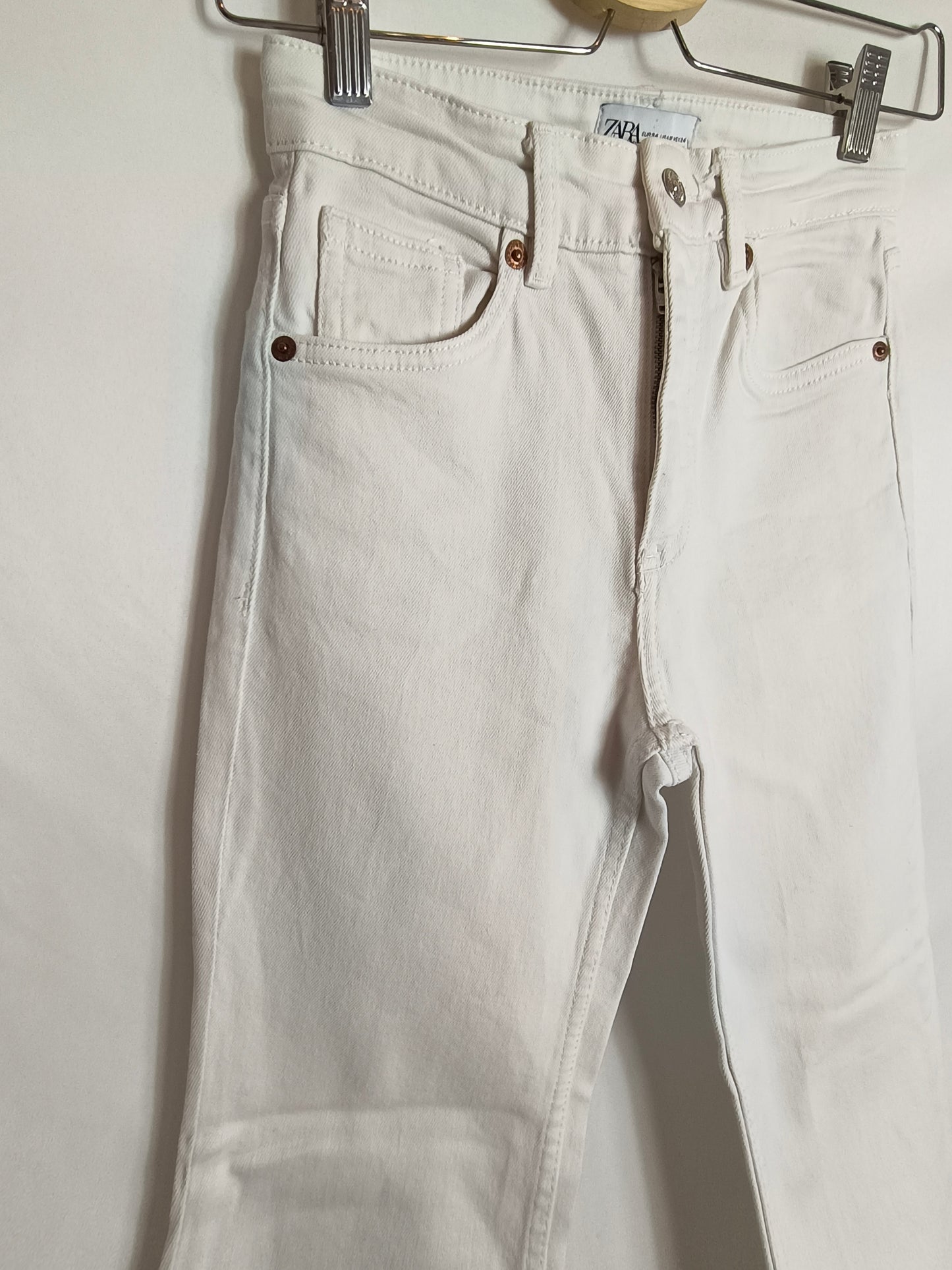 ZARA. White flared trousers, size 34