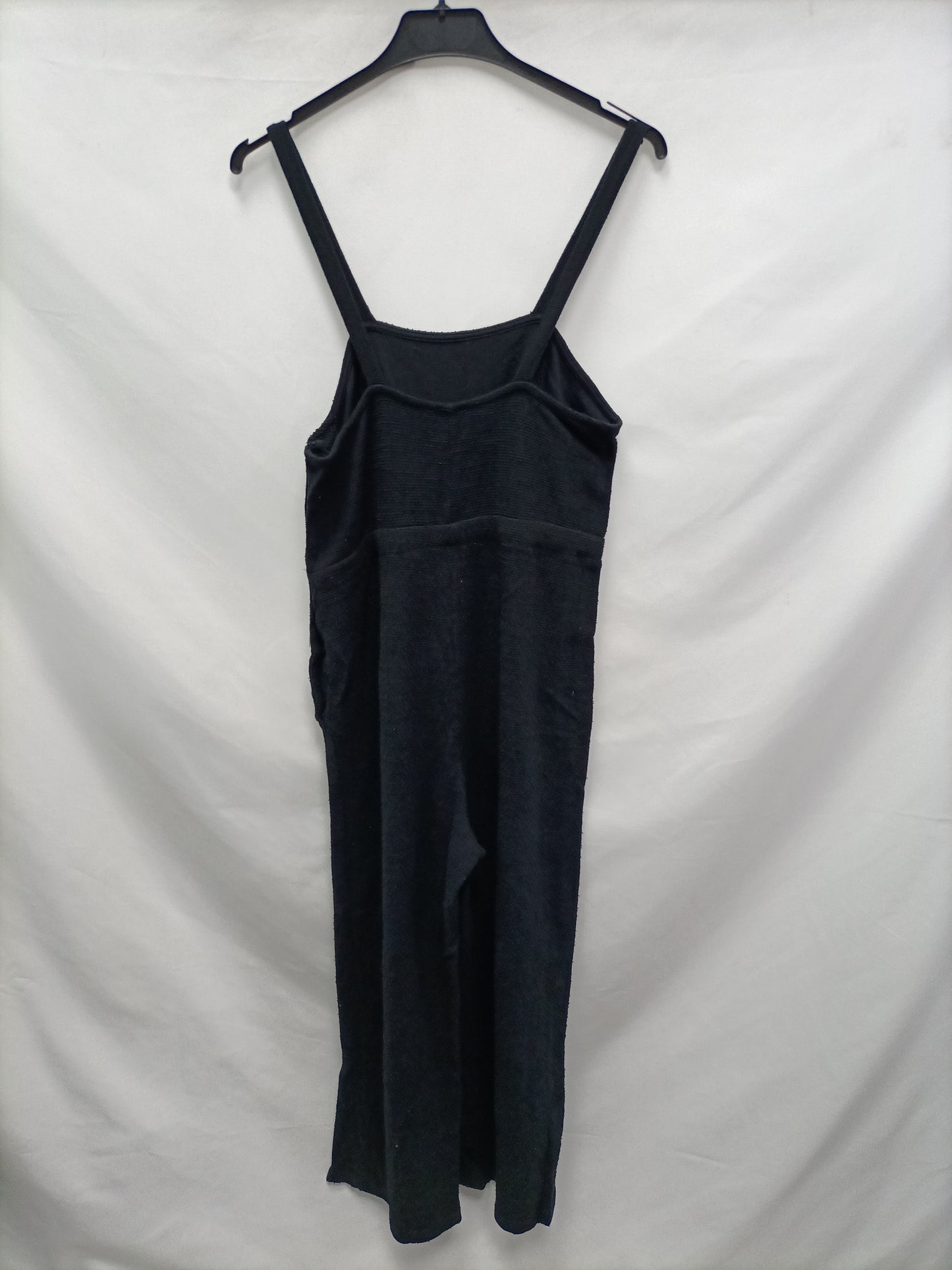 PULL&BEAR. Black buttoned jumpsuit.