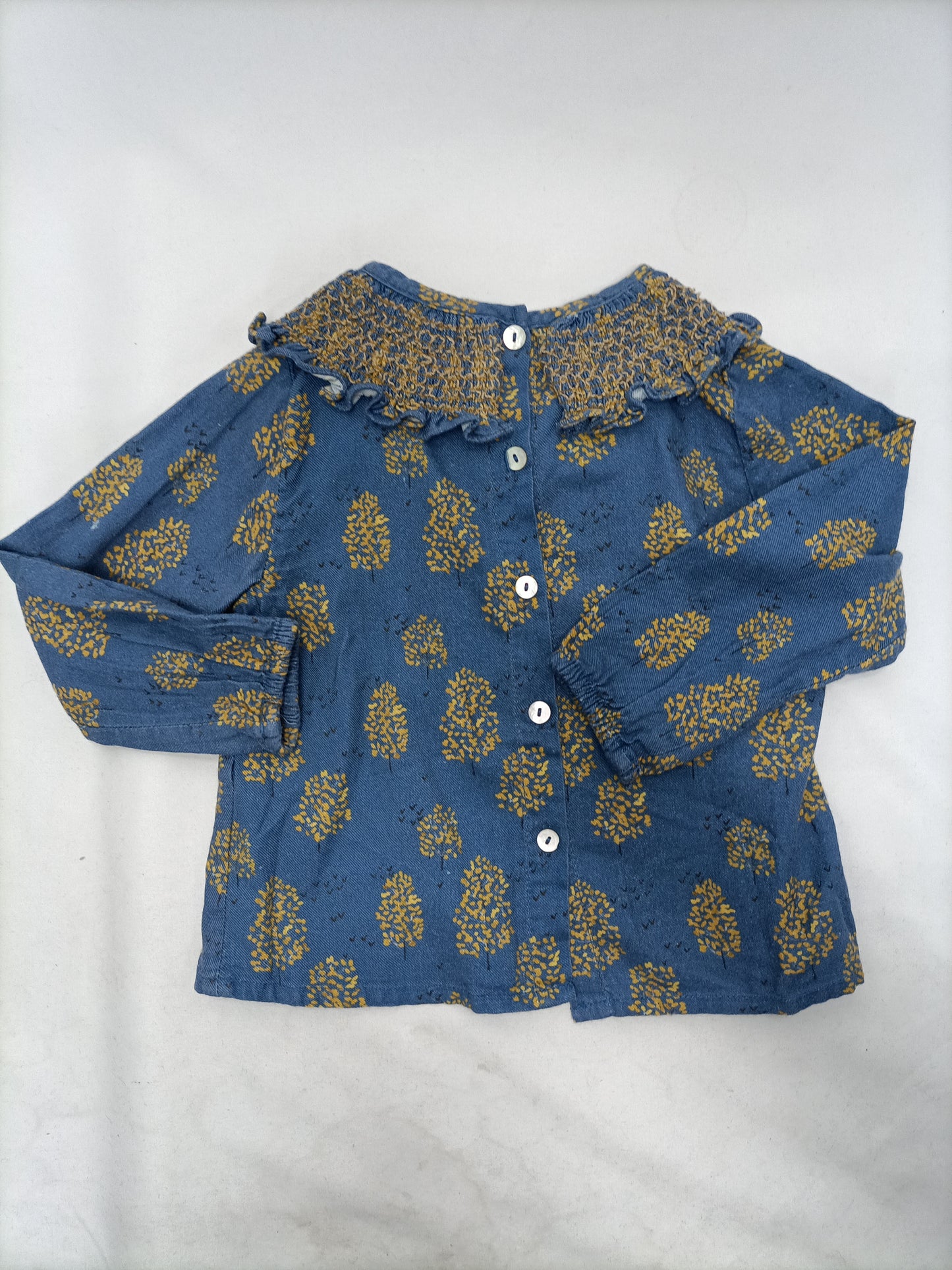 BONNET À POMPON. Blusa azul estampado T.18m