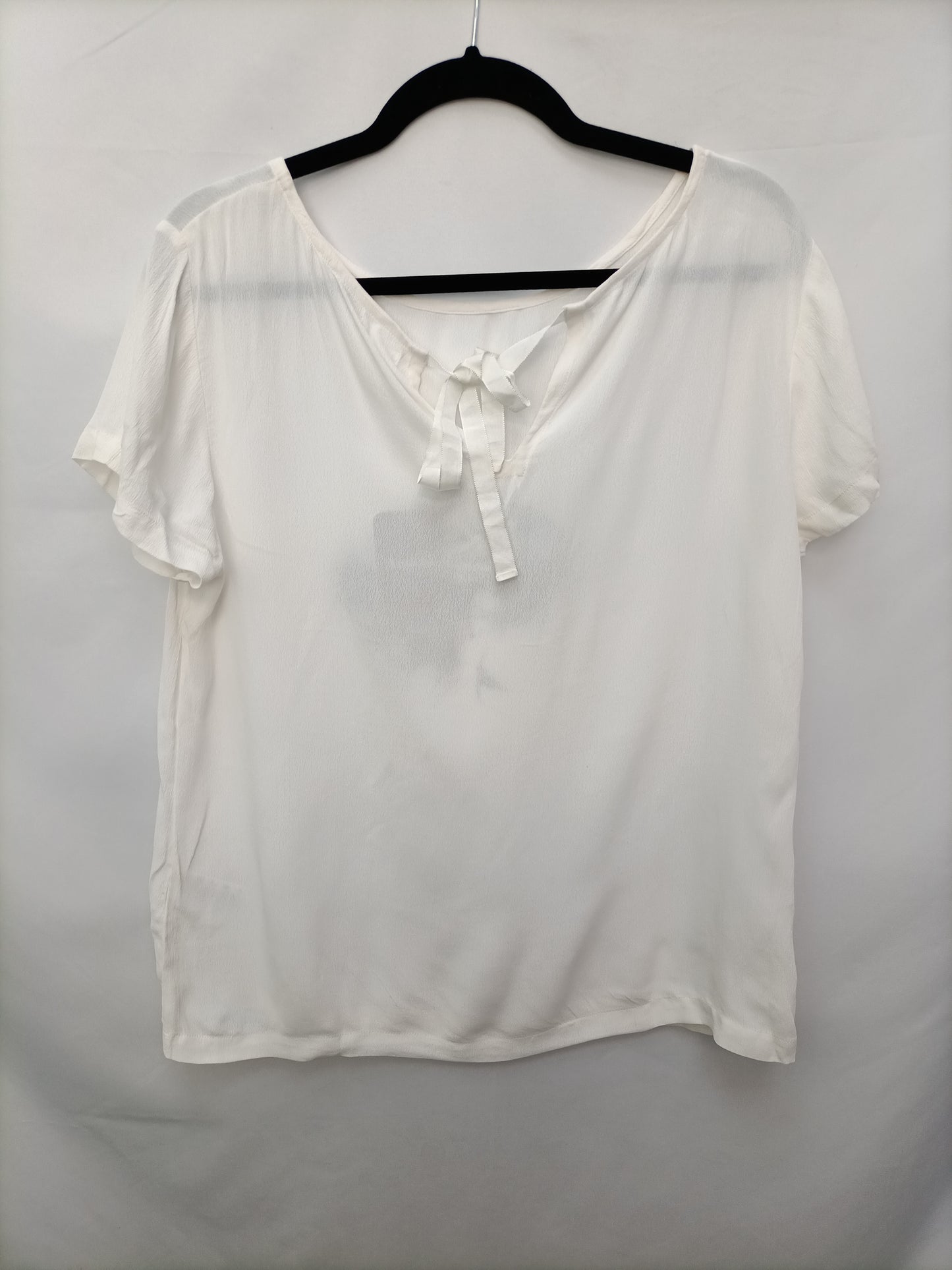 AMICHI. Blusa fluida rostro