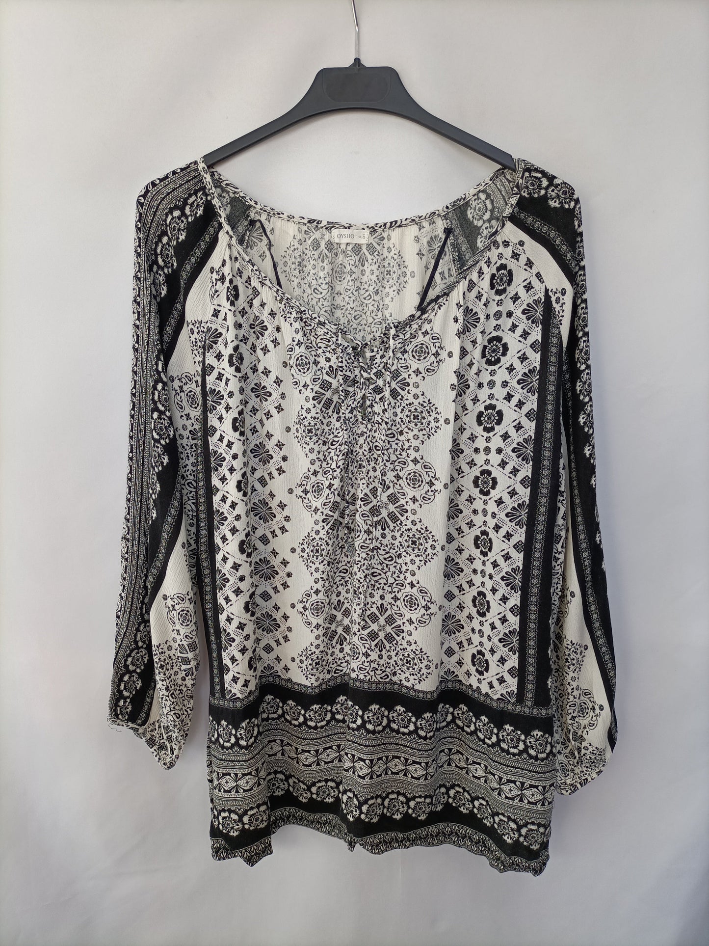 OYSHO. Blusa fluida flores T.s