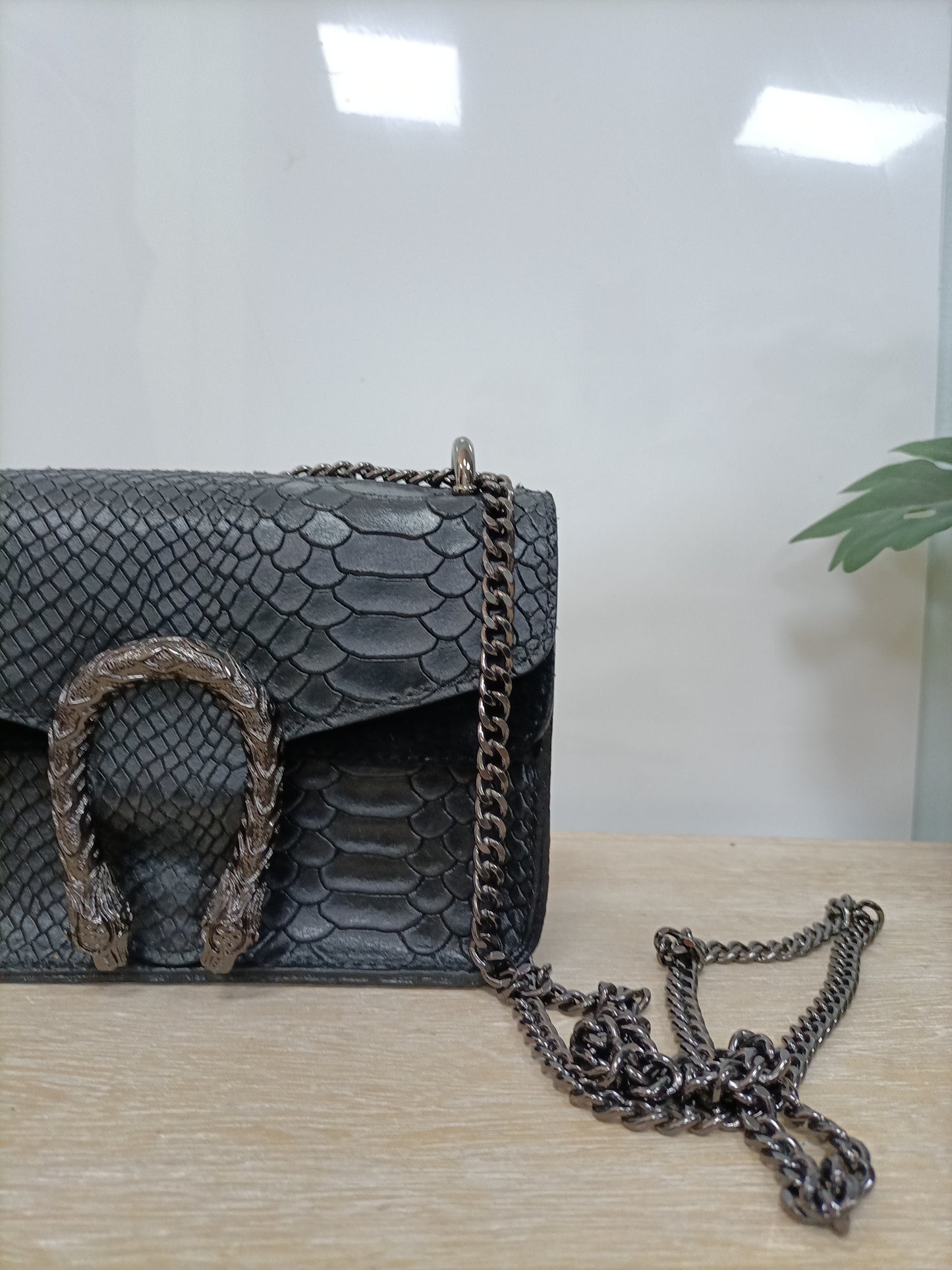 OTHERS. Black leather bag