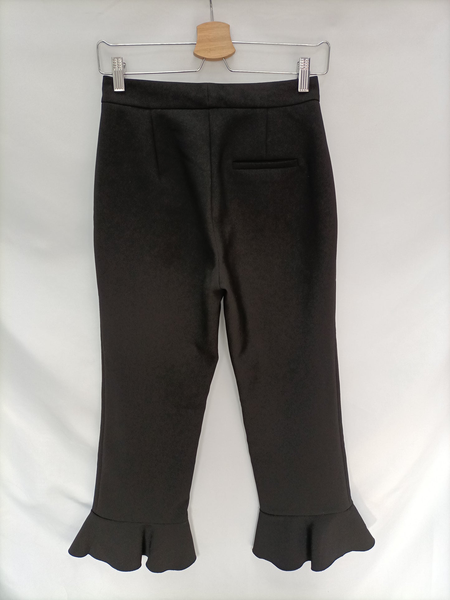 SFERA. Black trousers with ruffles Ts