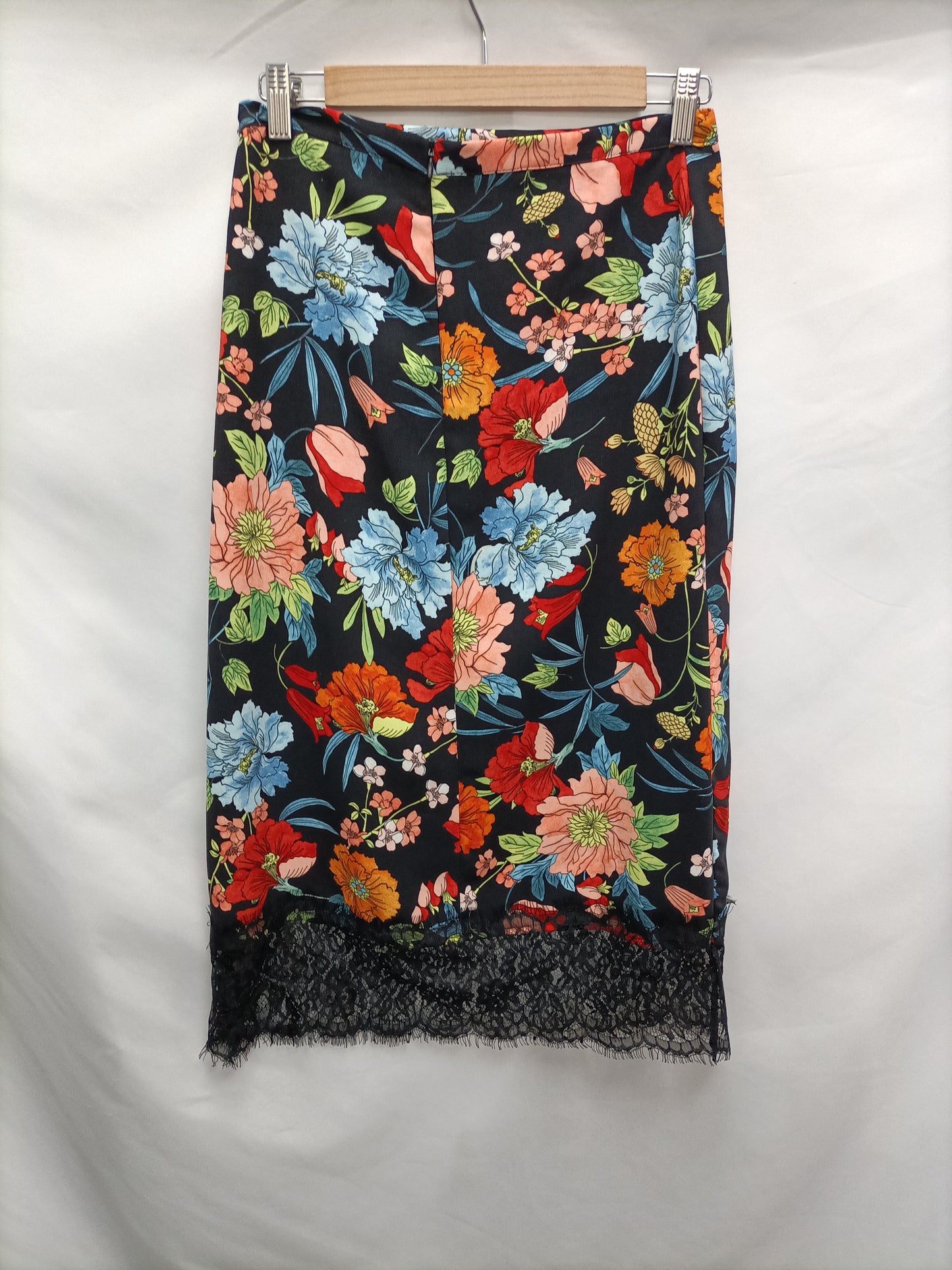 LICENCIA POÉTICA. Falda midi flores T.38