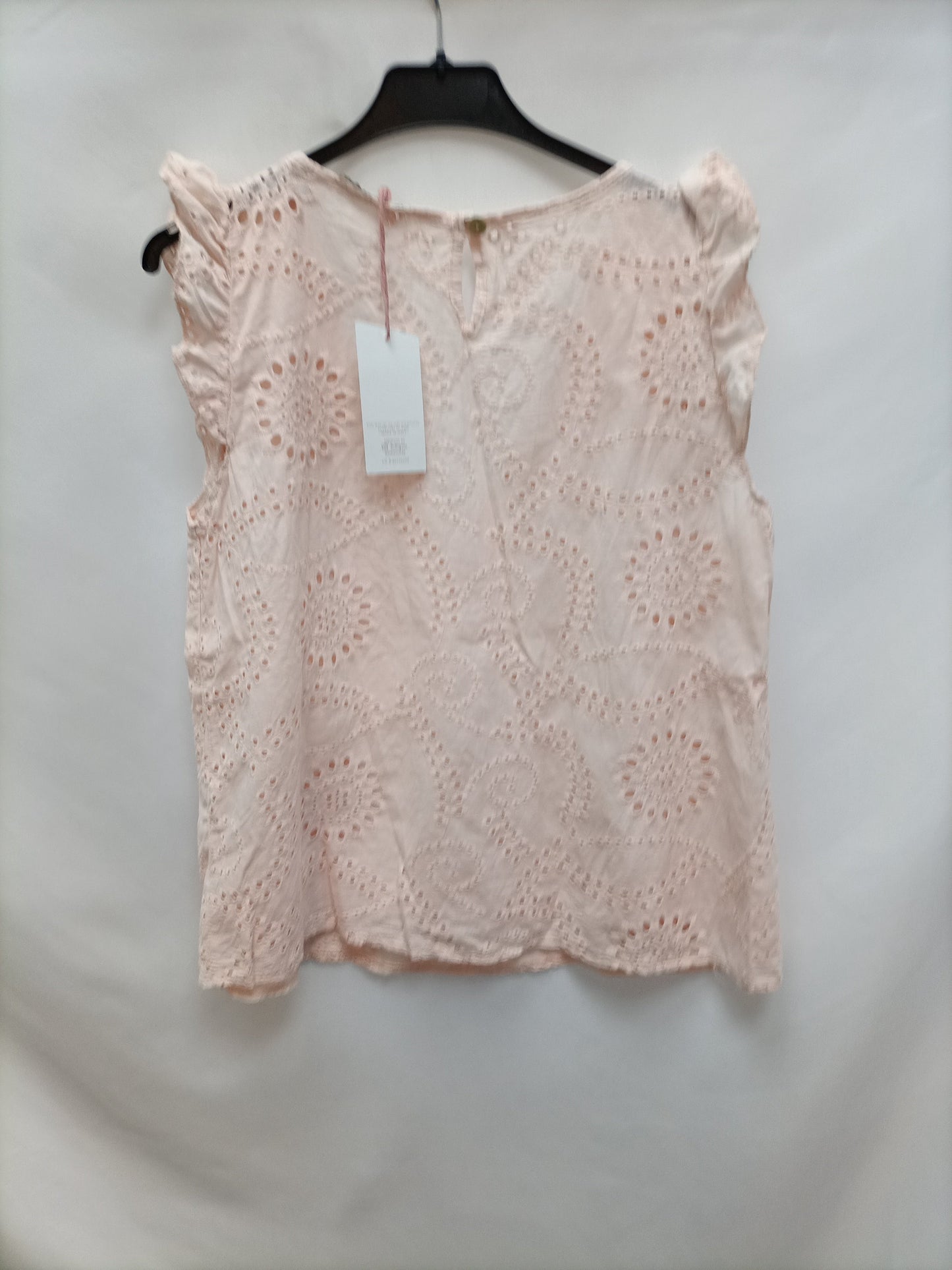 NEW COLECCTION. Blusa rosa troquelada T.