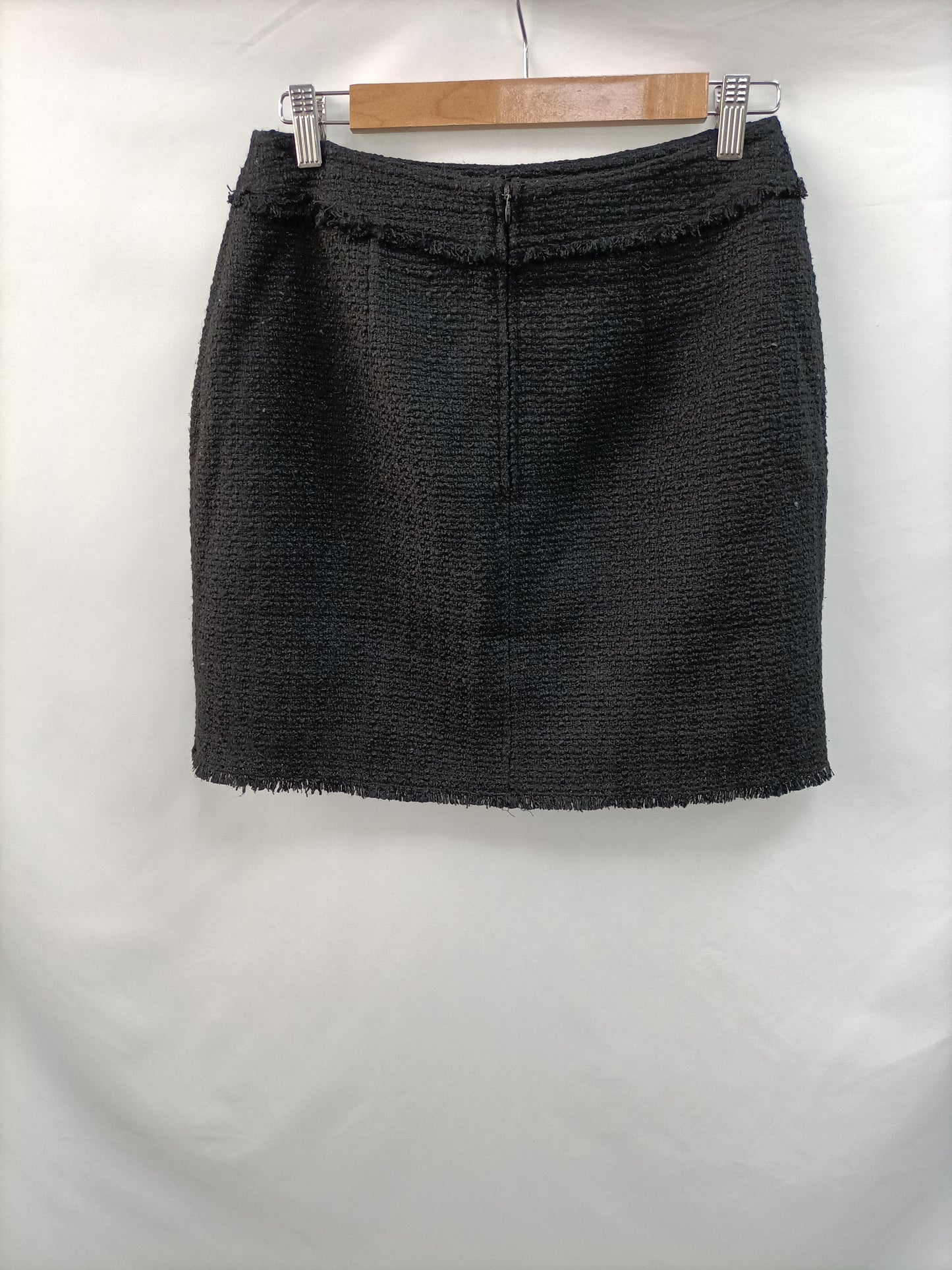 H&M. Falda tweed negra T.38