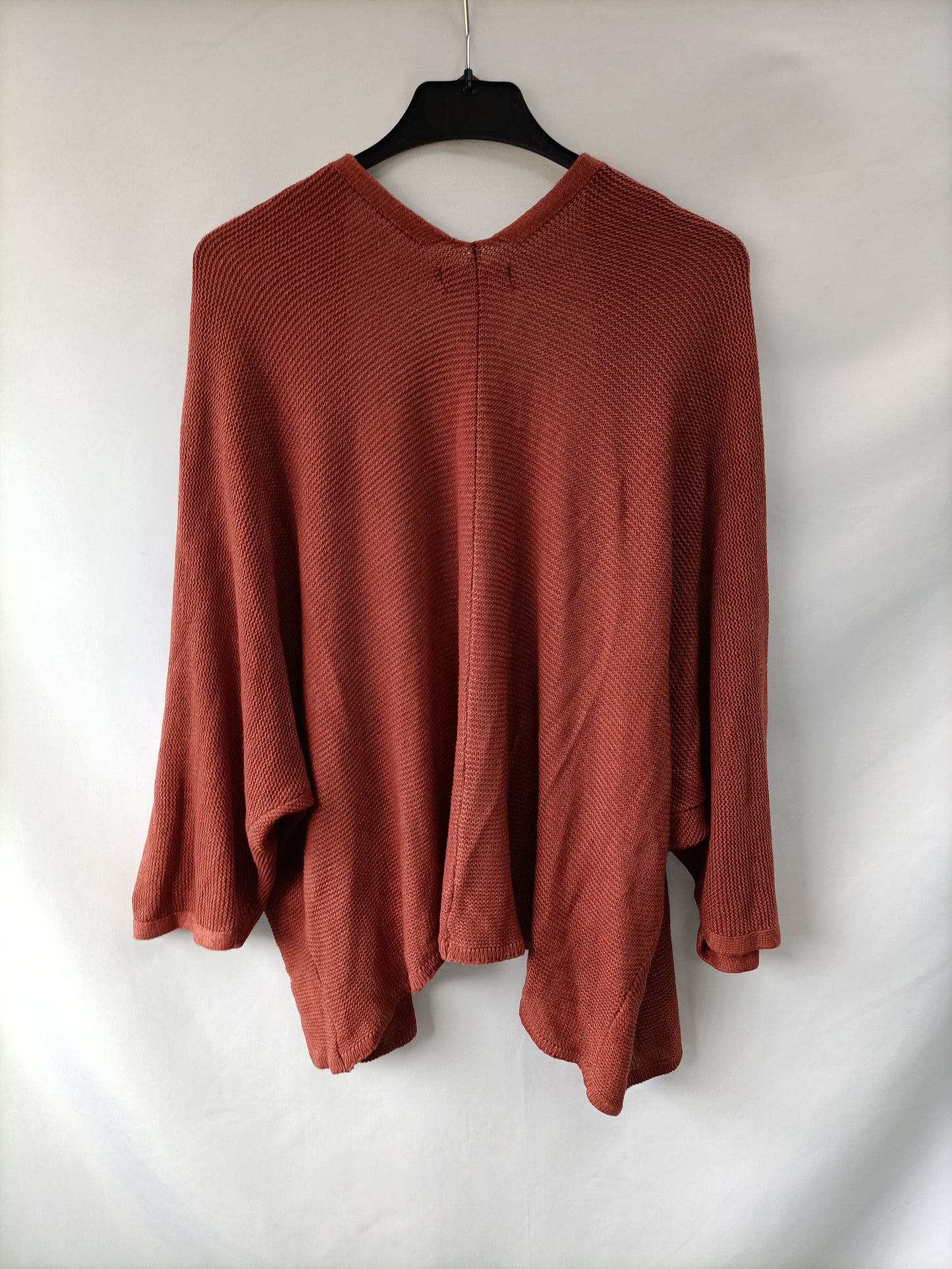 CARINA RICCI. Cárdigan teja T.u