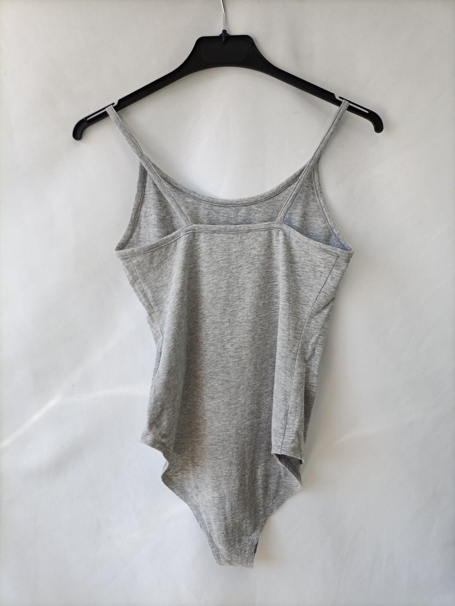 PRIMARK. Body grid letters T.40