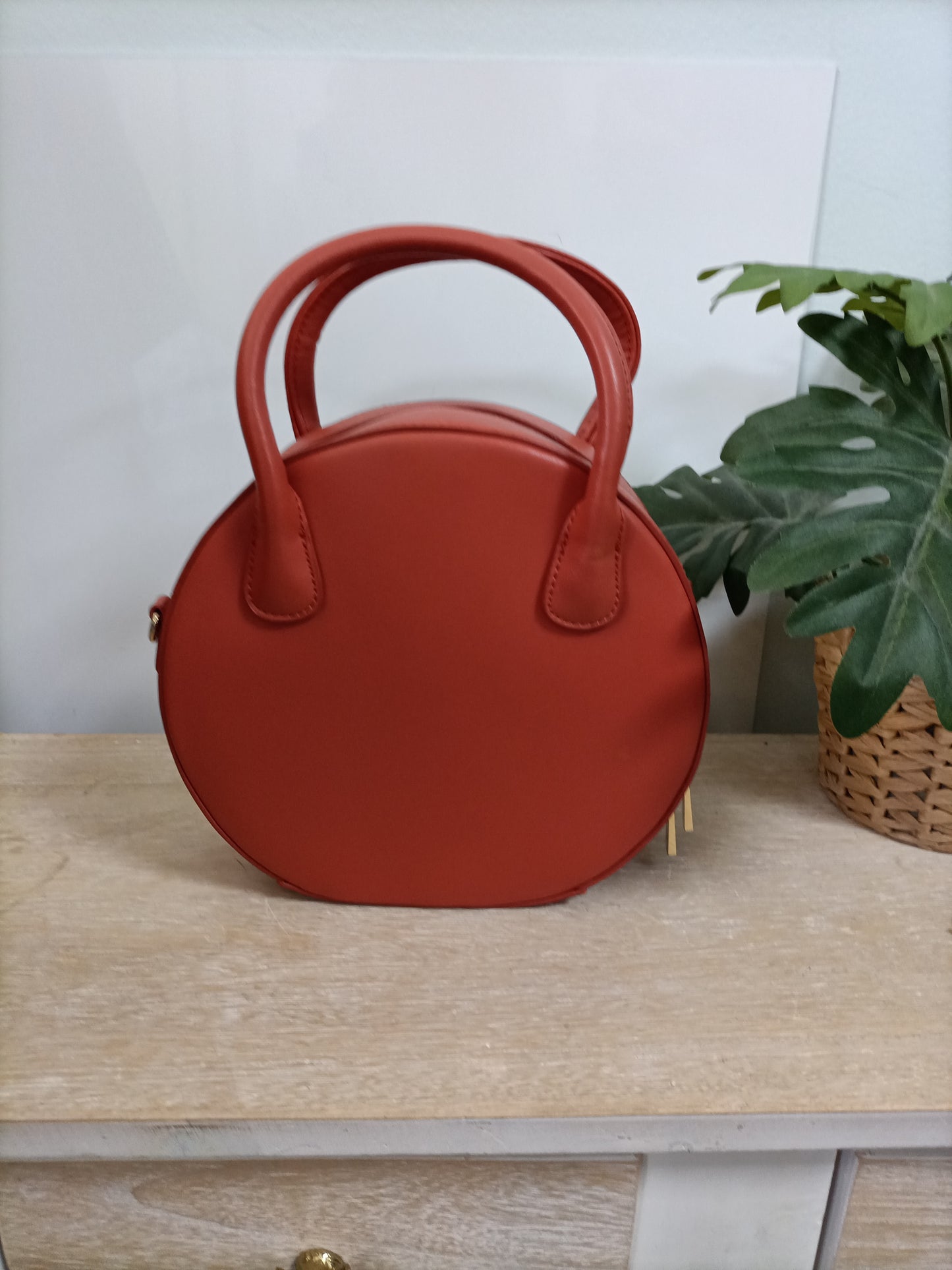 JO&MR JOE. Bolso naranja redondo