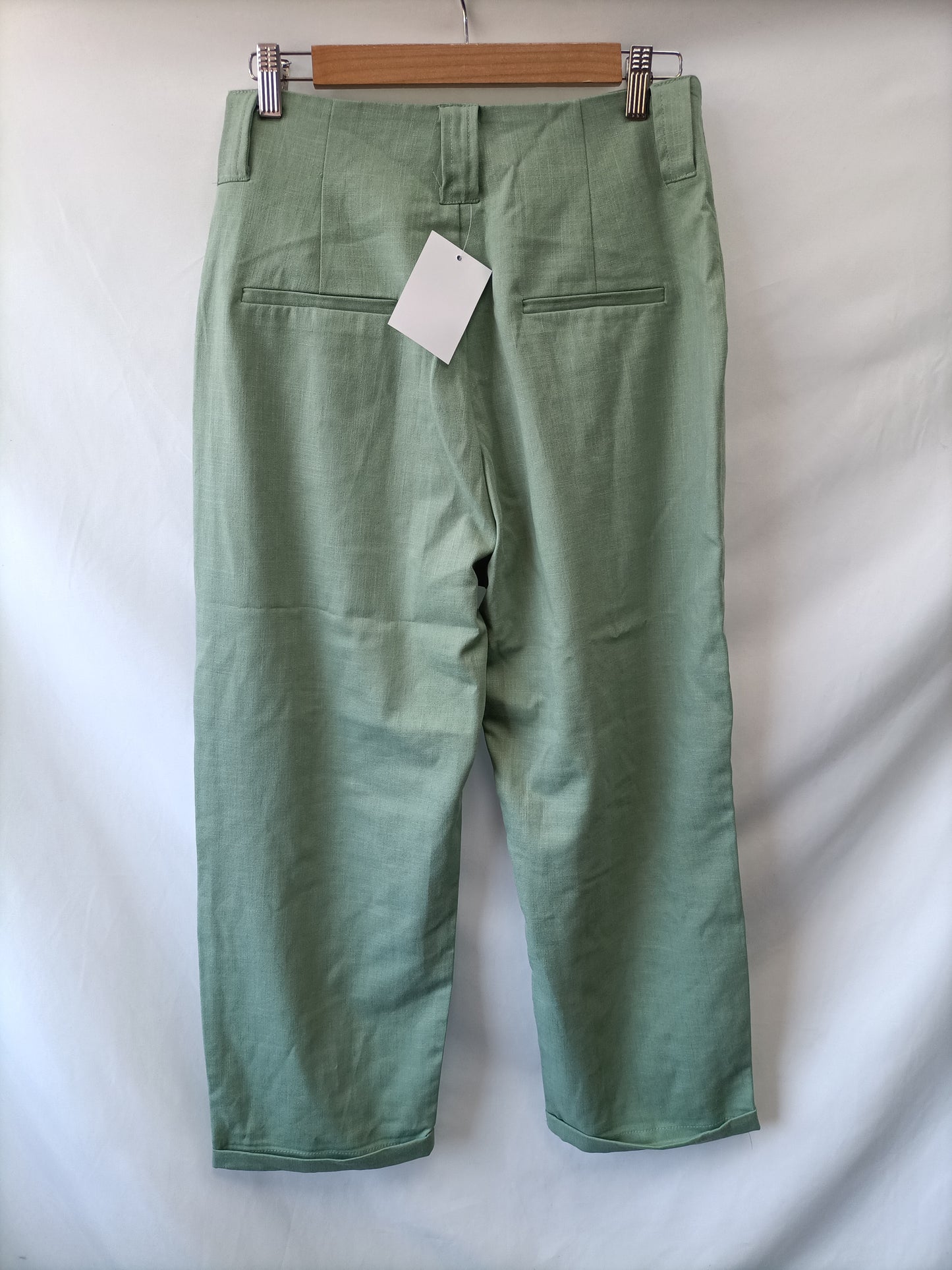 STRADIVARIUS.Pantalones anchos verde pastel T.40