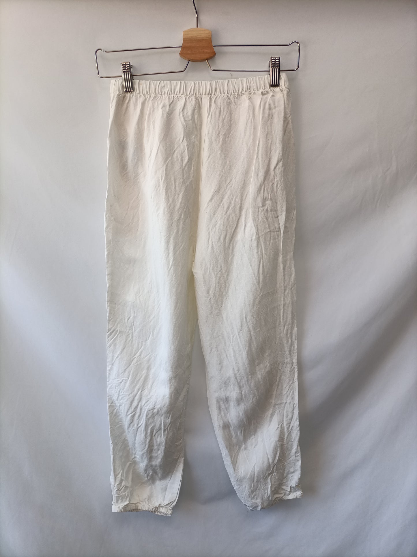 OYSHO.Pantalones fluidos blancos T.XS