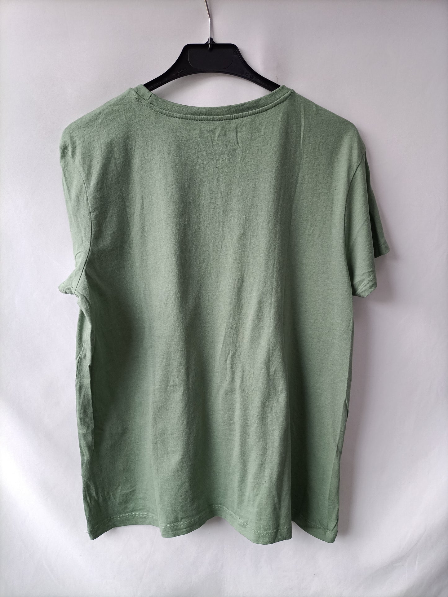 PRIMARK. Camiseta verde dibujo T.m