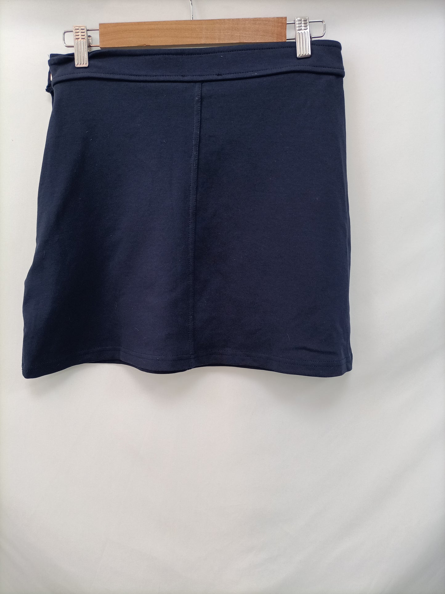 H&M. Falda azul elástica T.m