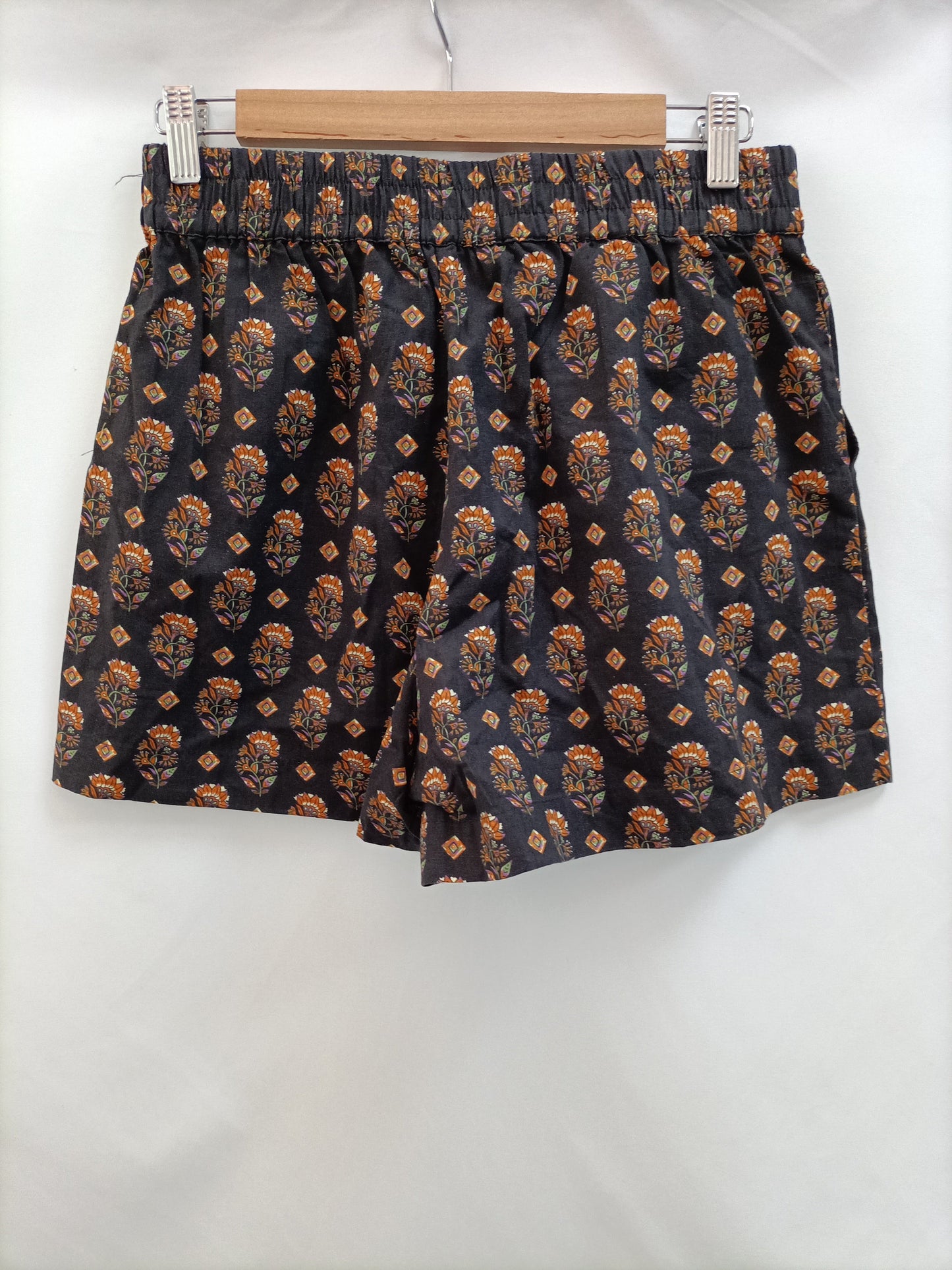 MANGO. Short marrón flores T.m