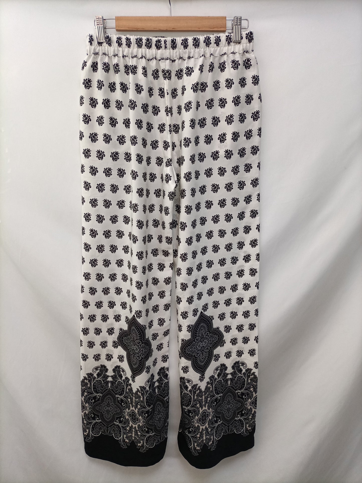 ZARA. Floral palazzo pants Ts