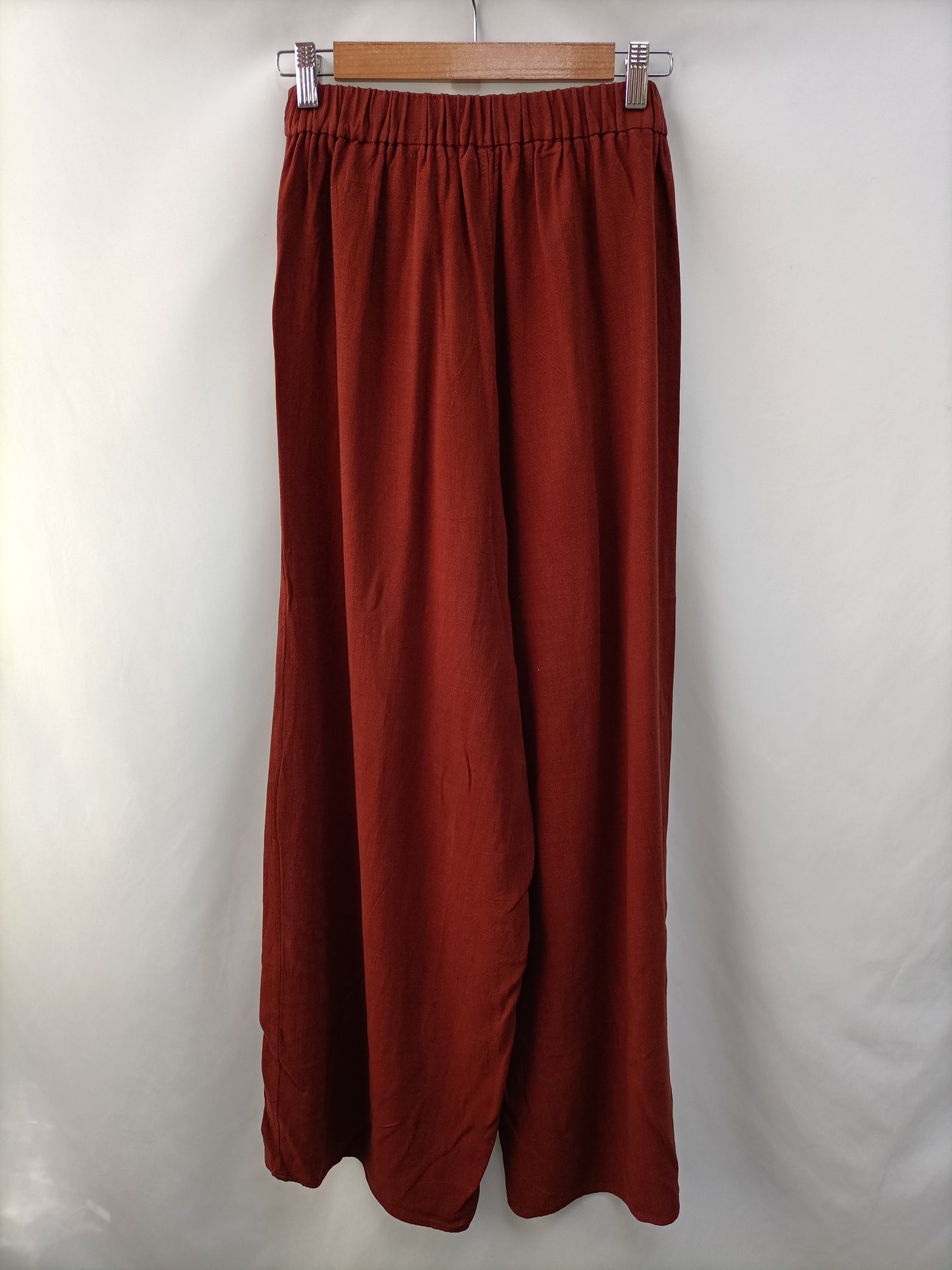 OTRAS.Pantalones fluidos teja Tu. (s)