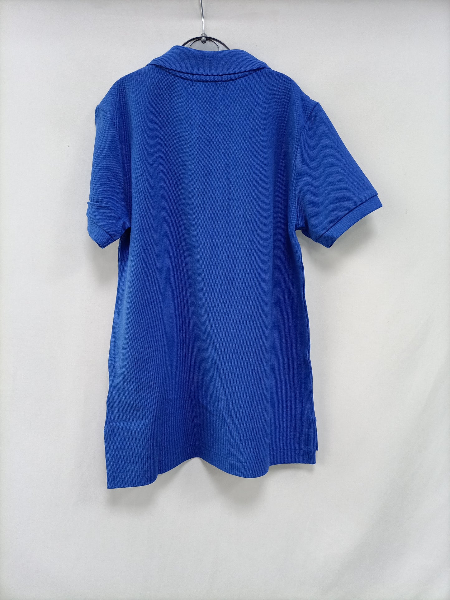 RALPH LAUREN. Polo azul T.7 años