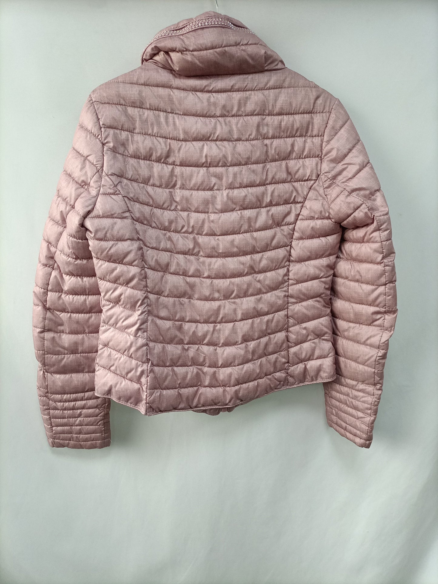 OTRAS. Plumas rosa ligero T.m (tara)