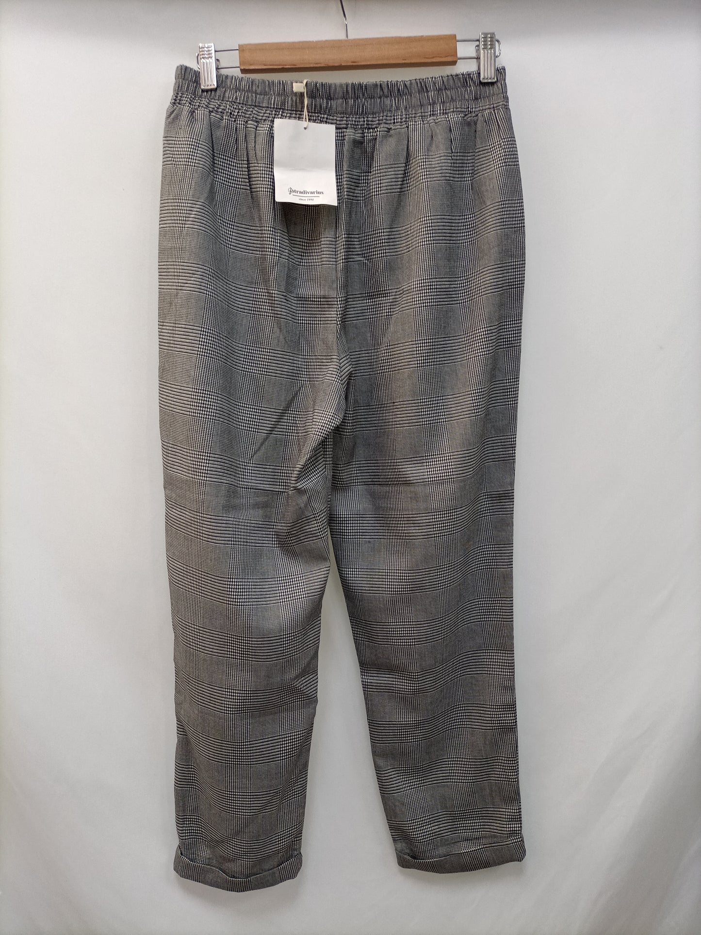 STRADIVARIUS. Flowy checked trousers Tm