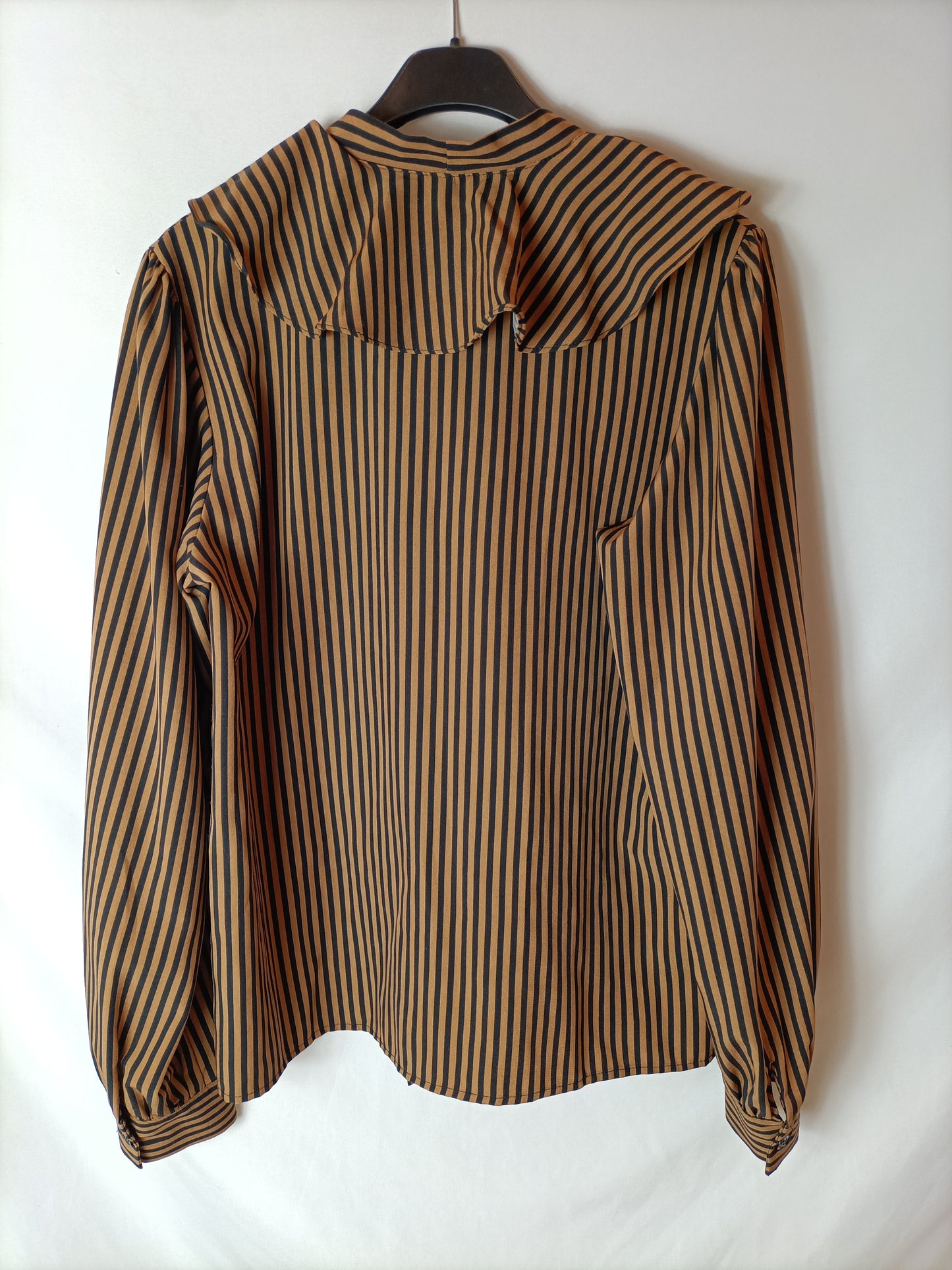 ELLI WHITE. Striped and ruffled Ts blouse