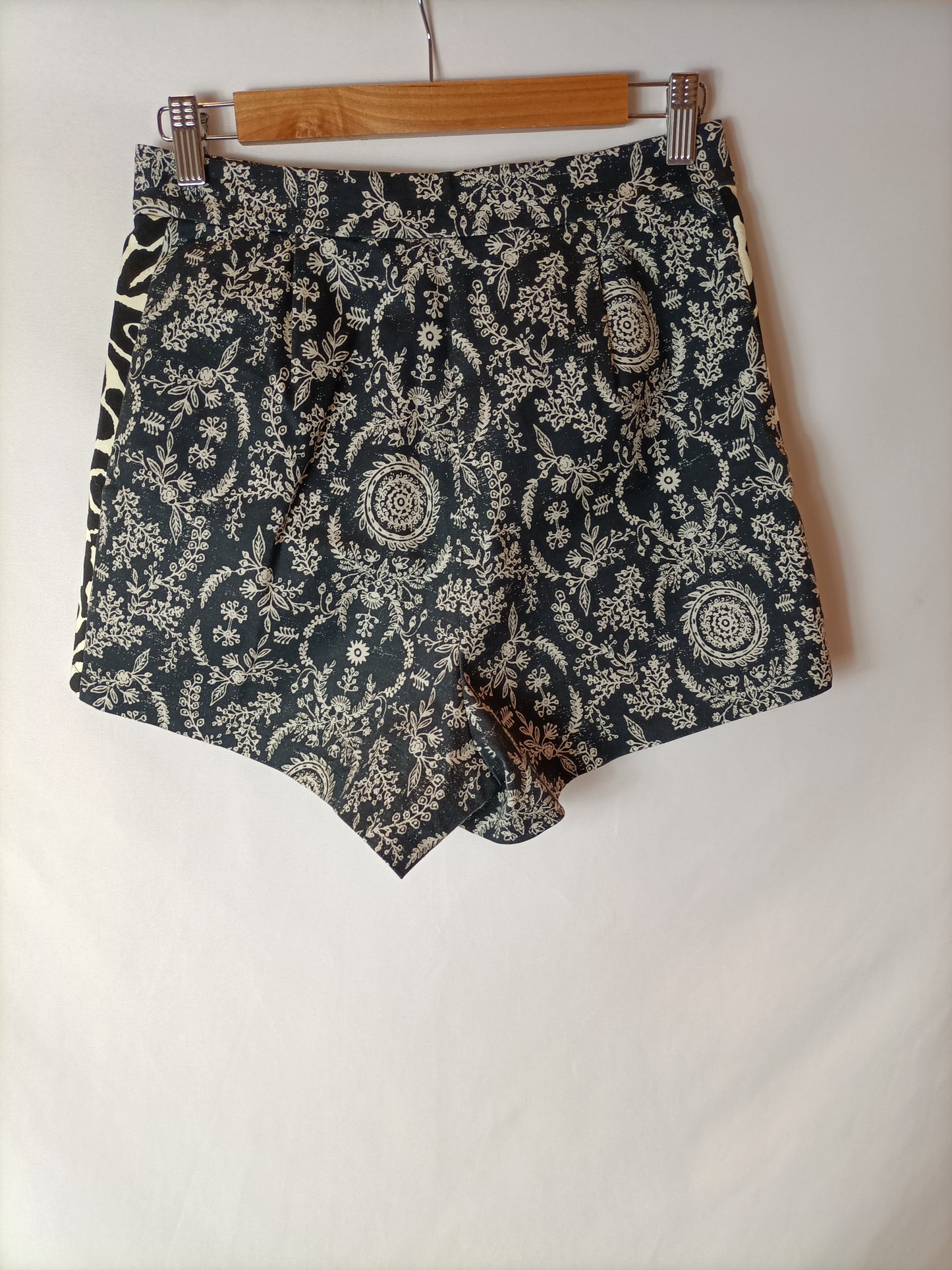 PINKO. Black printed shorts T.36