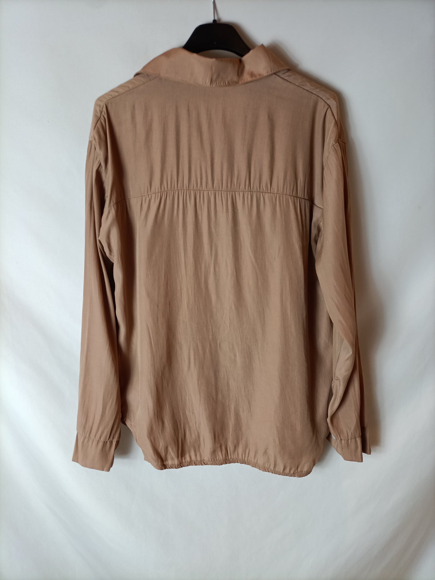 OTHERS. Light brown flowing blouse. TS