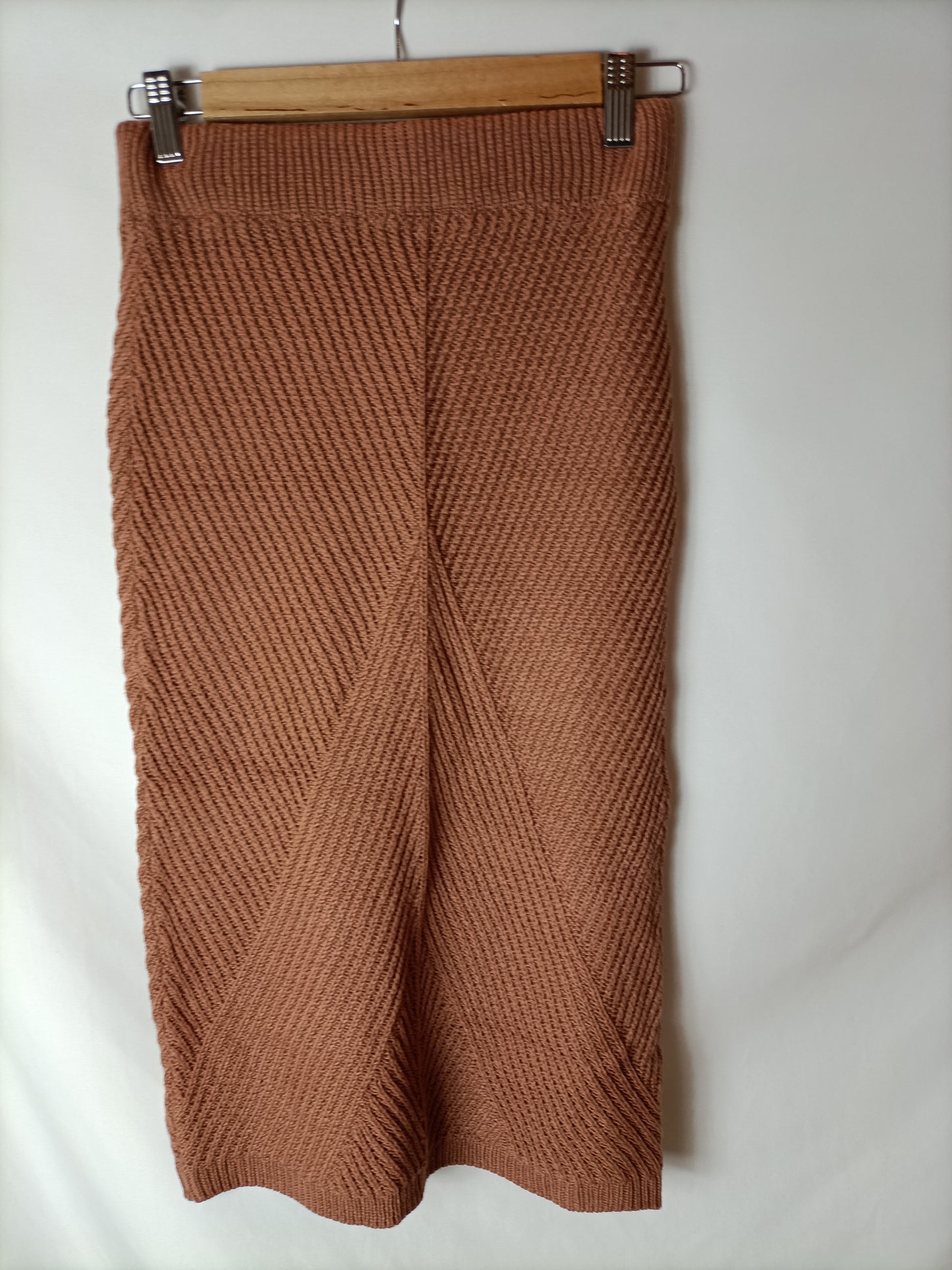 OTHER. Total look: brown knit skirt and sweater. TS