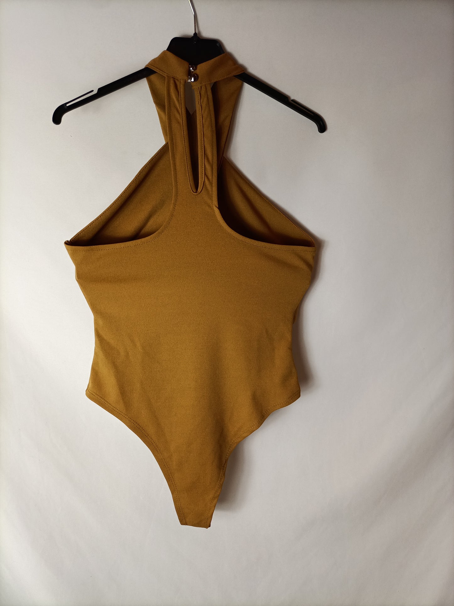OTHERS. Mustard bodysuit with openings. TS