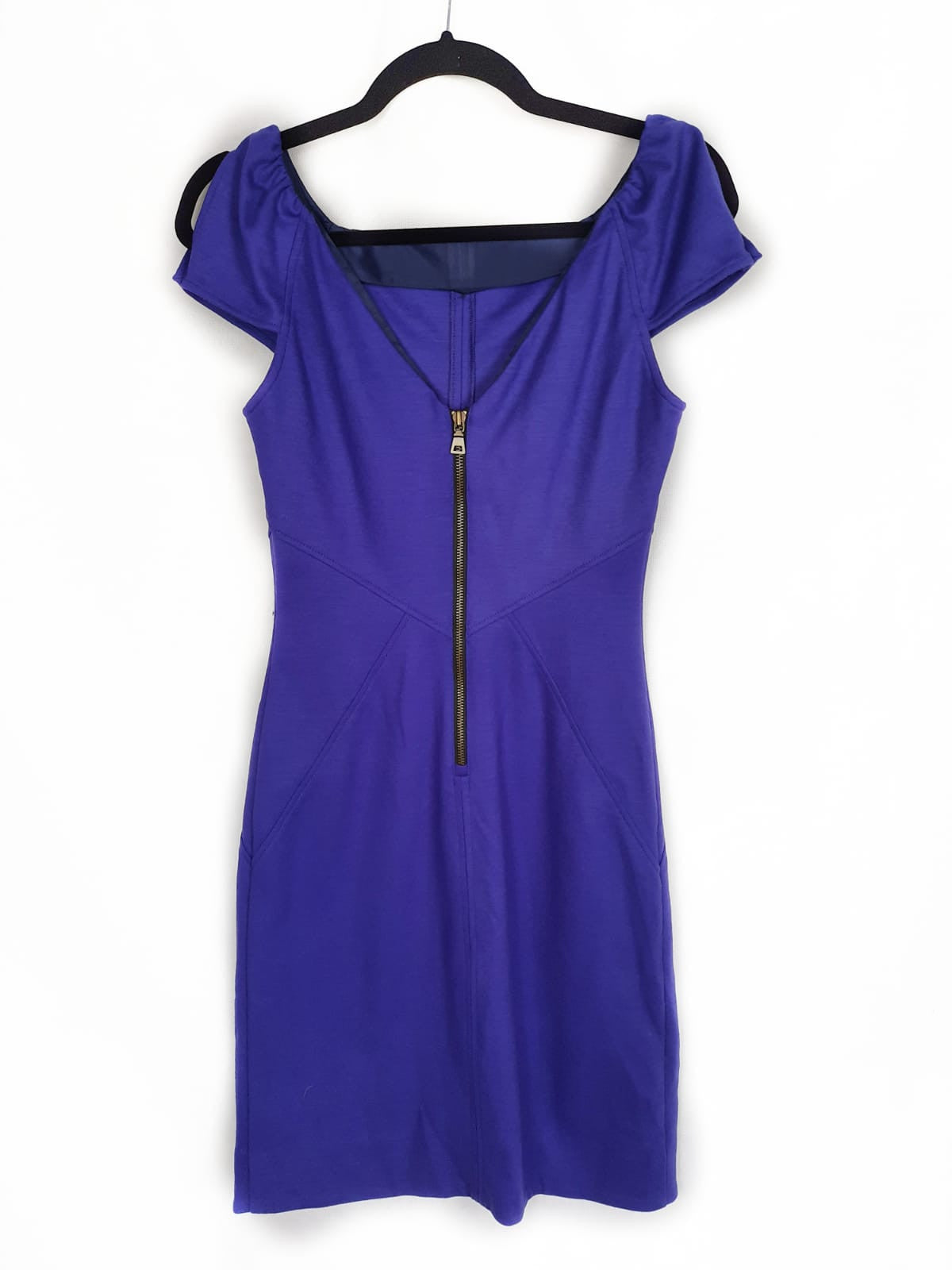 Diane von Furstenbergs. Purple dress, size yours.