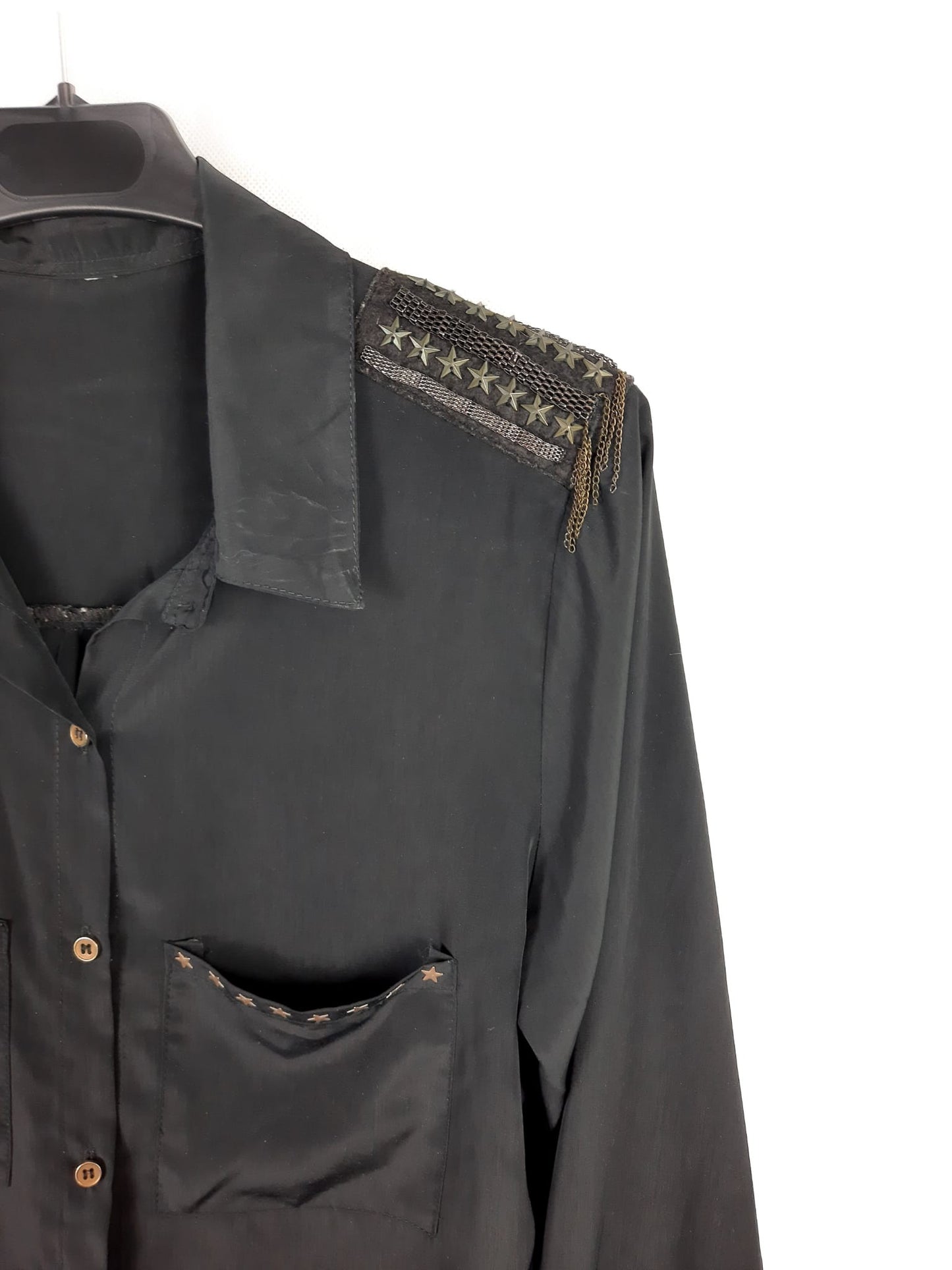 OTRAS. Blusa hombreras estrella T.u