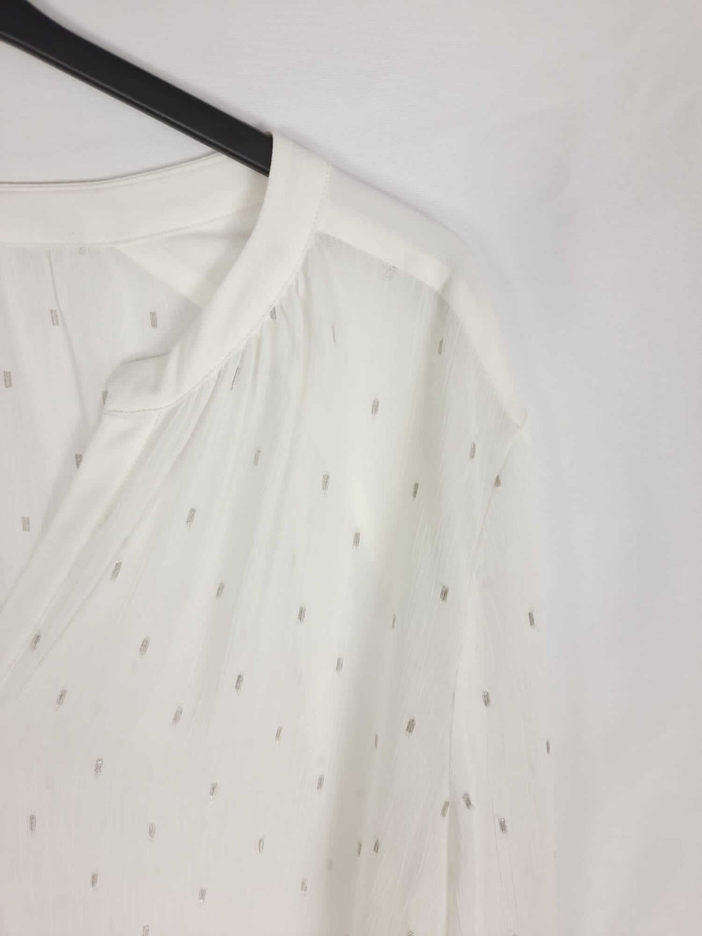 ELOGY.Blusa plumeti plateado T.L