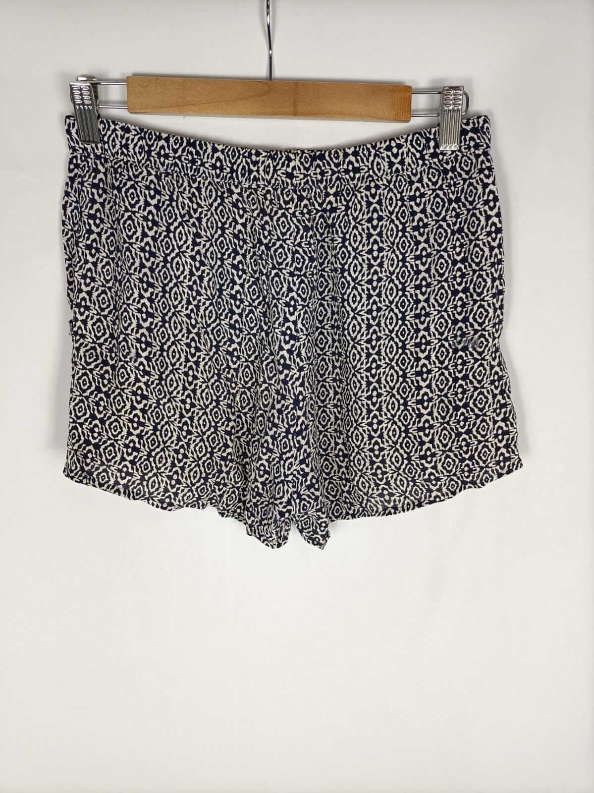 OYSHO.Shorts bolsillos lentejuelas T.m
